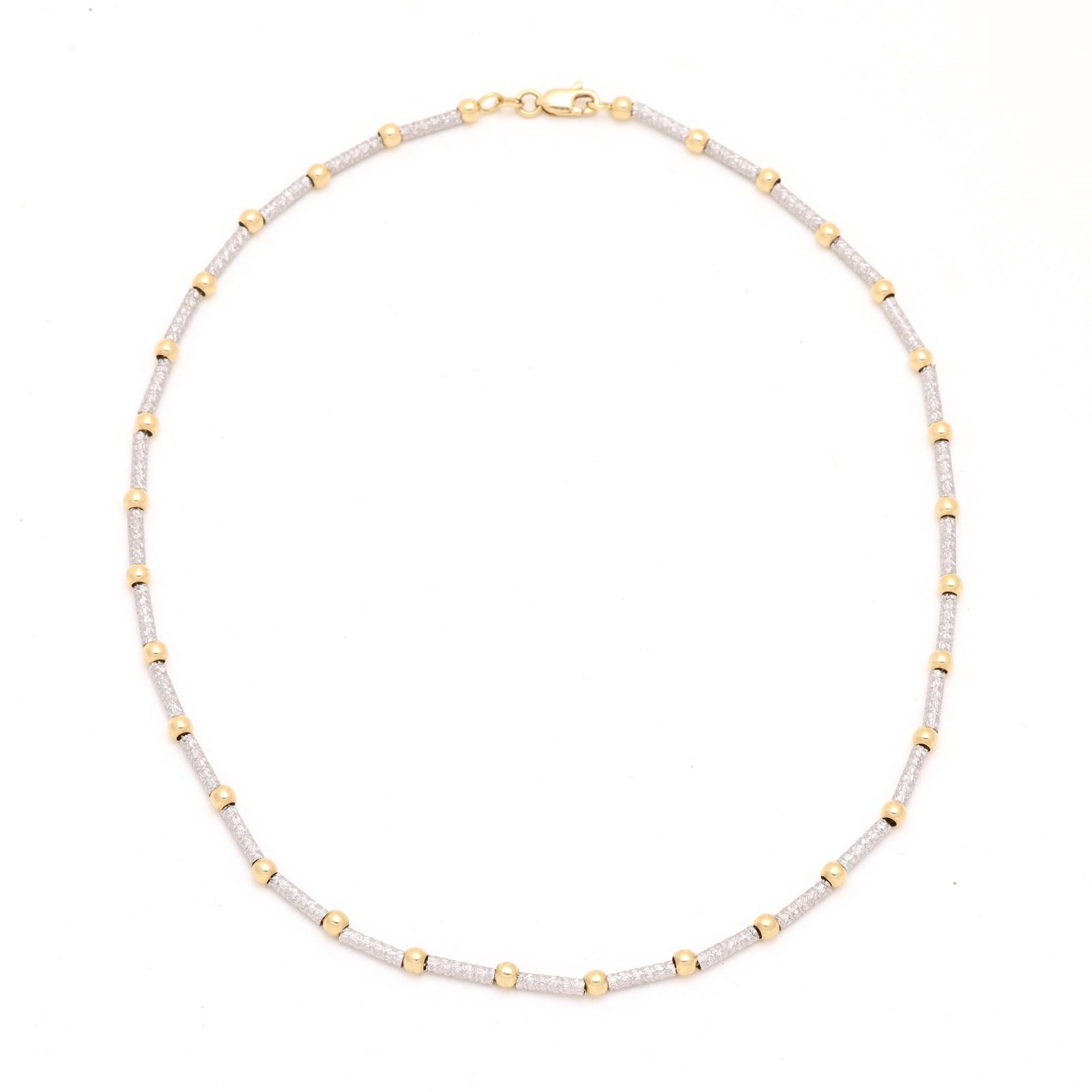 Bi-Color Gold Fancy Link Necklace: Bi-Color Gold Fancy Link Necklace the beaded station necklace with alternating yellow gold beads (3mm) and textured, cylindrical, white gold links, completed with a lobster clasp, stamped 14K and with