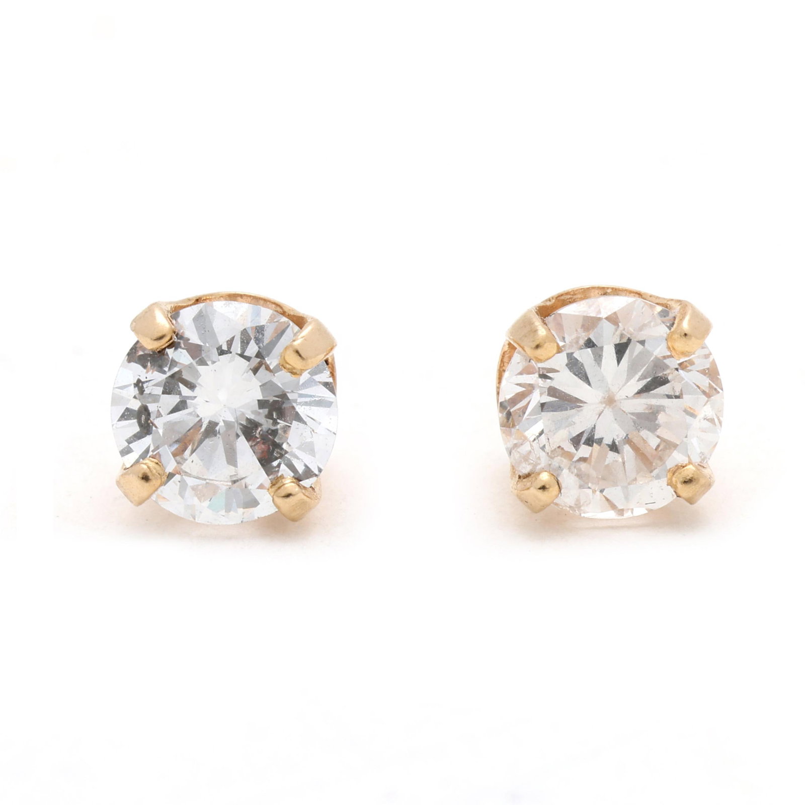 Gold and 1.30 Total Carat Diamond Stud Earrings: Gold and 1.30 Total Carat Diamond Stud Earrings the full cut round diamonds (5.47-5.52mm; 5.45-5.53mm) weighing approximately .65 carat and .65 carat (G color, I1 clarity; E color, I1 clarity), comple