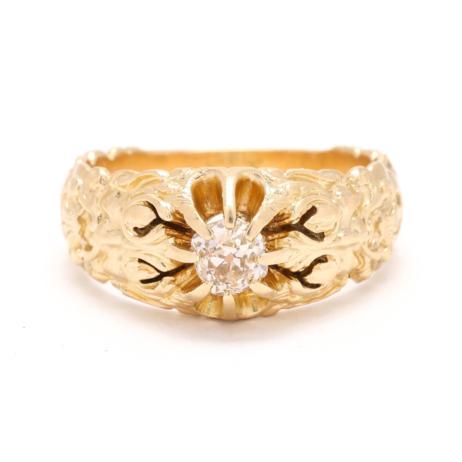 Gold and Diamond Ring: Gold and Diamond Ring centered on an old mine cut diamond (5.0 x 4.8 x 3.8mm) weighing approximately .60 carat (J color, VS1 clarity), with carved mythological wild man mask to shoulders, stamped 14K 