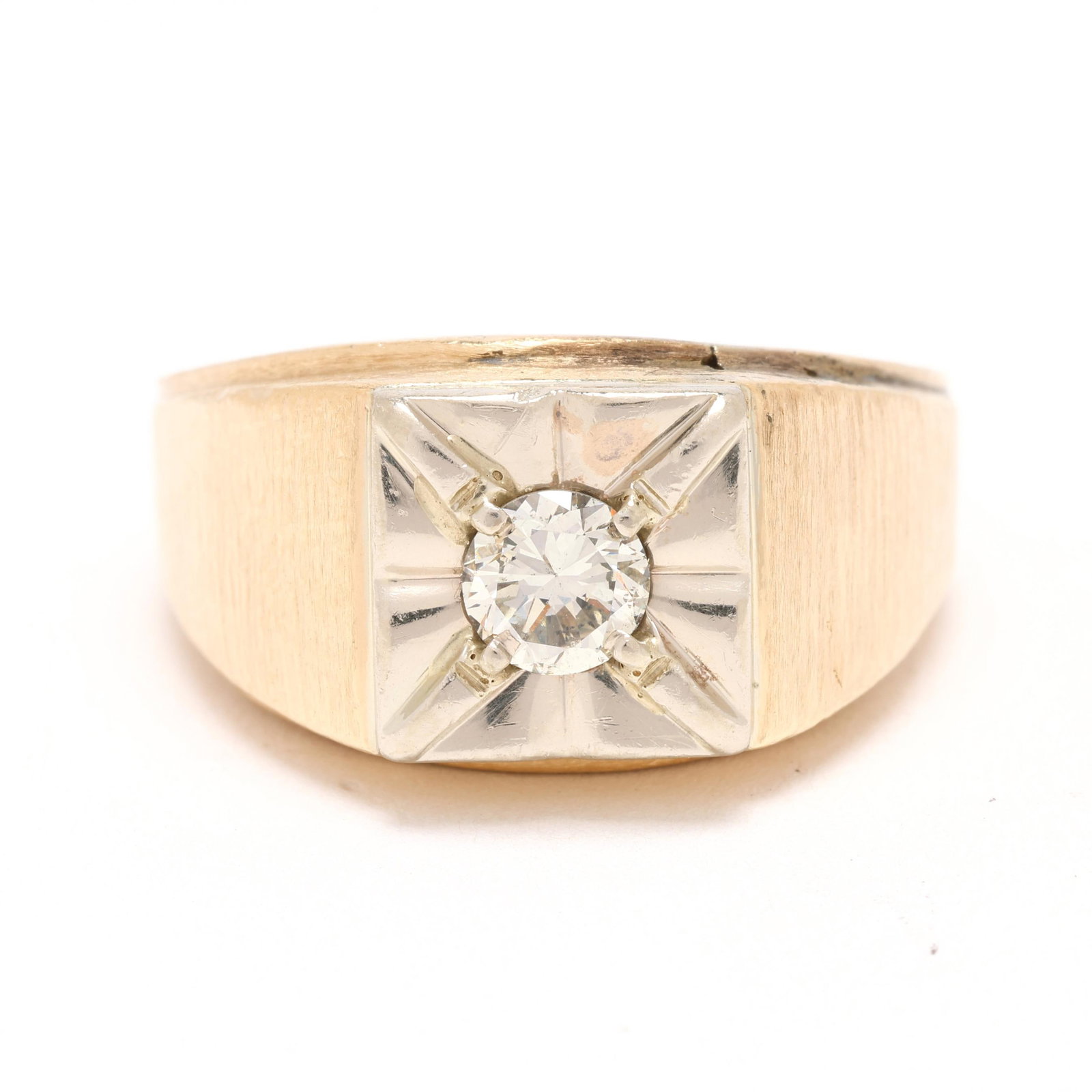 Gent's Gold and Diamond Ring: Gent's Gold and Diamond Ring centered on a round cut diamond (5.35 - 5.45 x 3.45mm) weighing approximately .62 carat (I color, SI2 clarity) set in a square faceted top with textured gold shoulders, st