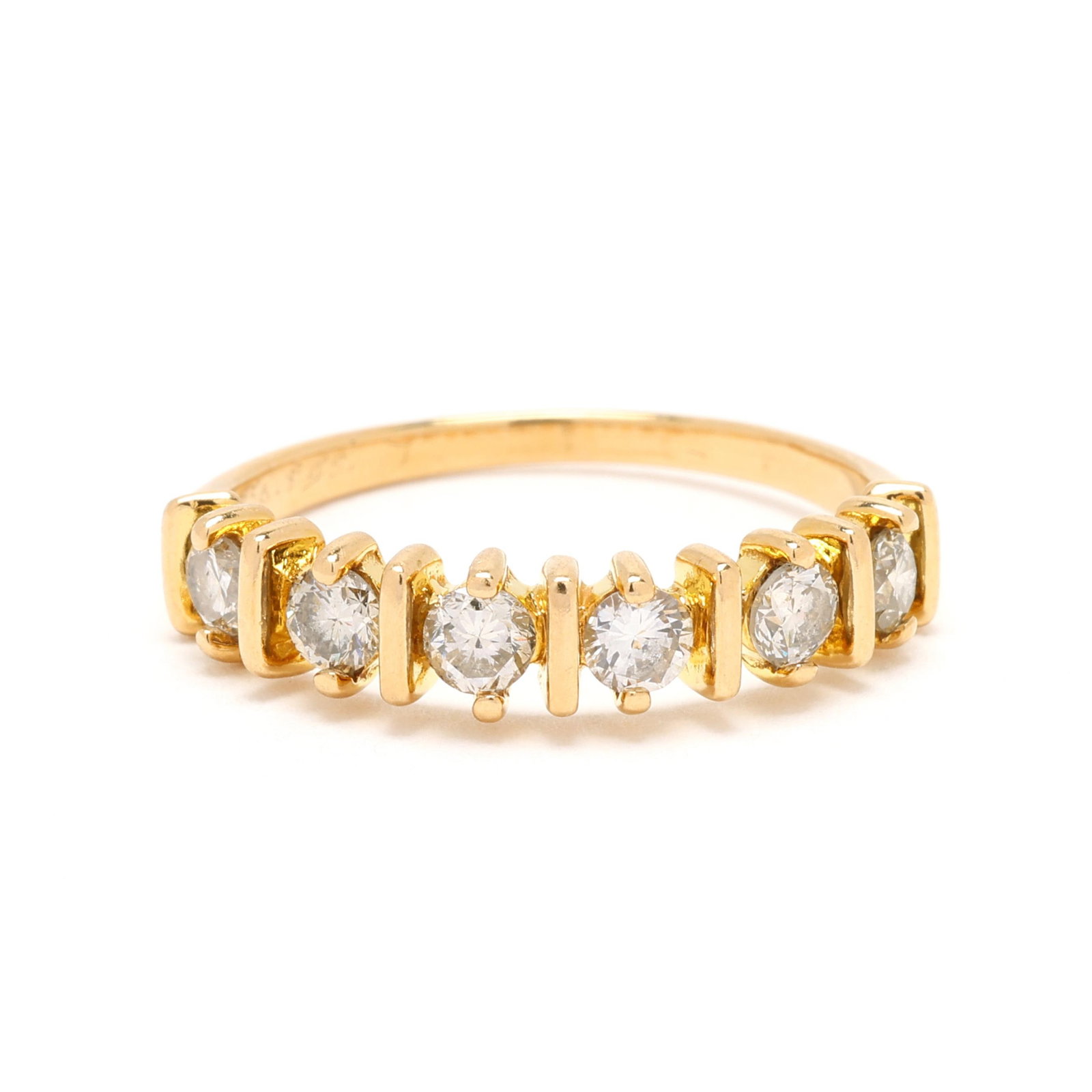 Gold and Diamond Band: Gold and Diamond Band the ring with bar motif, set with full cut round diamonds weighing .56 total carat (J-K color, SI2-I1 clarity), stamped 0.56, 750. P45. 4.3mm; Ring size 6 1.5 dwt. Additional hig