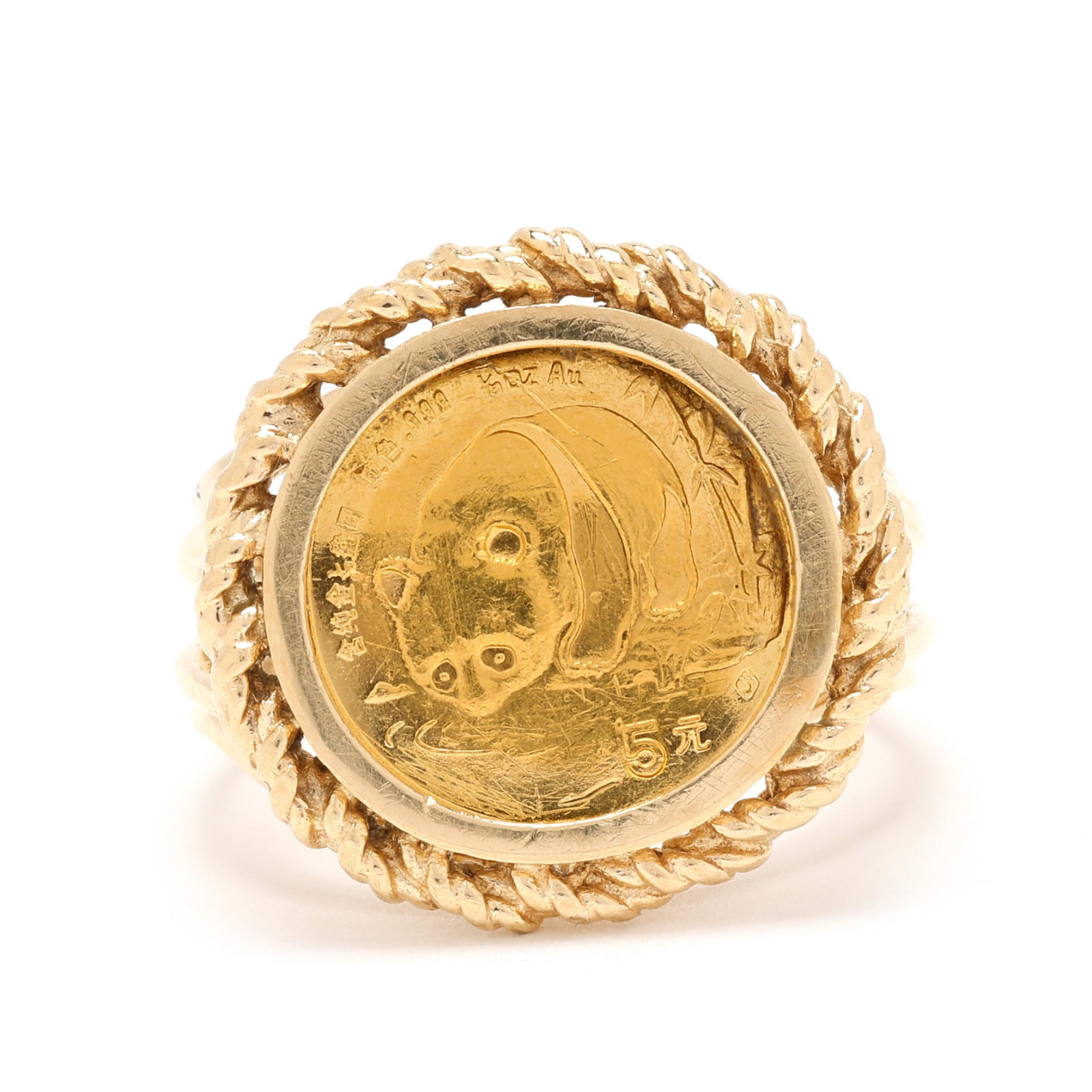 Chinese 5 Yuan Gold Coin Ring: Chinese 5 Yuan Gold Coin Ring centered on a Chinese 5 yuan gold coin, featuring the image of a panda, bezel set within a rope twist border, completed with a split shank, stamped 10K and coin testing 2