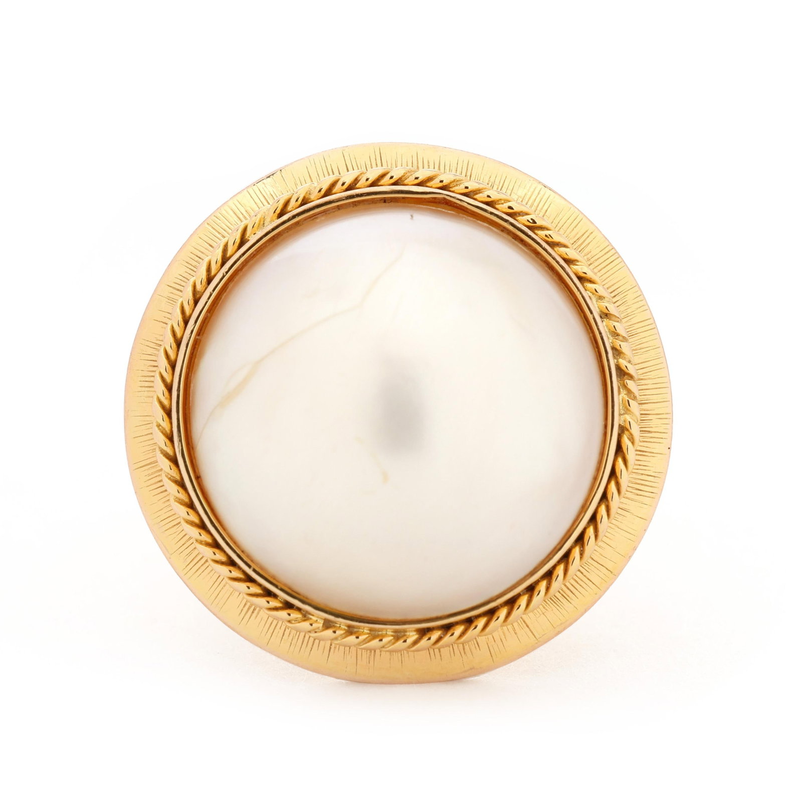 Gold and Pearl Ring: Gold and Pearl Ring centered on a round mabé pearl (16mm) within a textured gold and rope motif surround, stamped 585 14K. 21mm; Ring size 5.5 5.0 dwt. Pearl displays a white bodycolor, good luster, 
