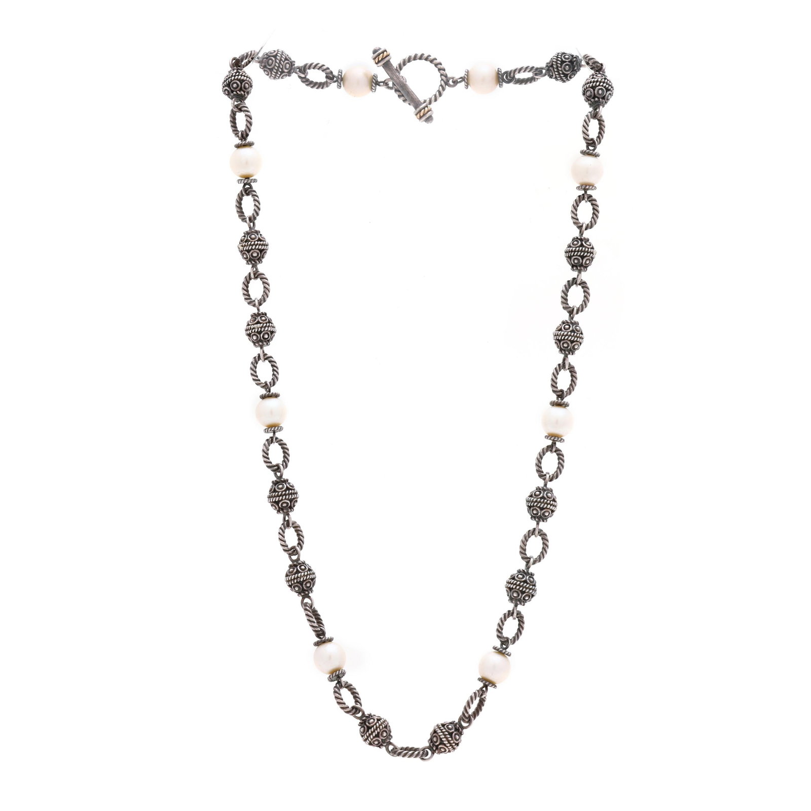 Silver and Pearl Necklace, Town & Country: Silver and Pearl Necklace, Town & Country the silver necklace with round cultured pearls (8mm) and round silver stations connected with rope motif links, completed with a toggle clasp with gold and si