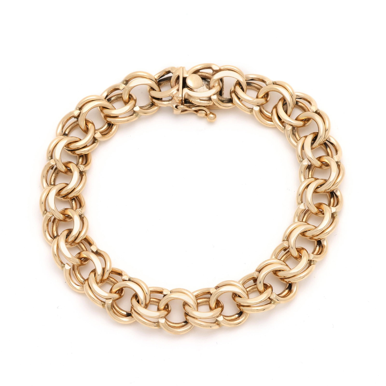 Gold Round Link Bracelet: Gold Round Link Bracelet the bracelet in a double, interlocking link design, completed with a box clasp and figure eight safety, stamped 14K. .5 x 7 7/8 in. 29.3 dwt. Private Collection, North Carolin