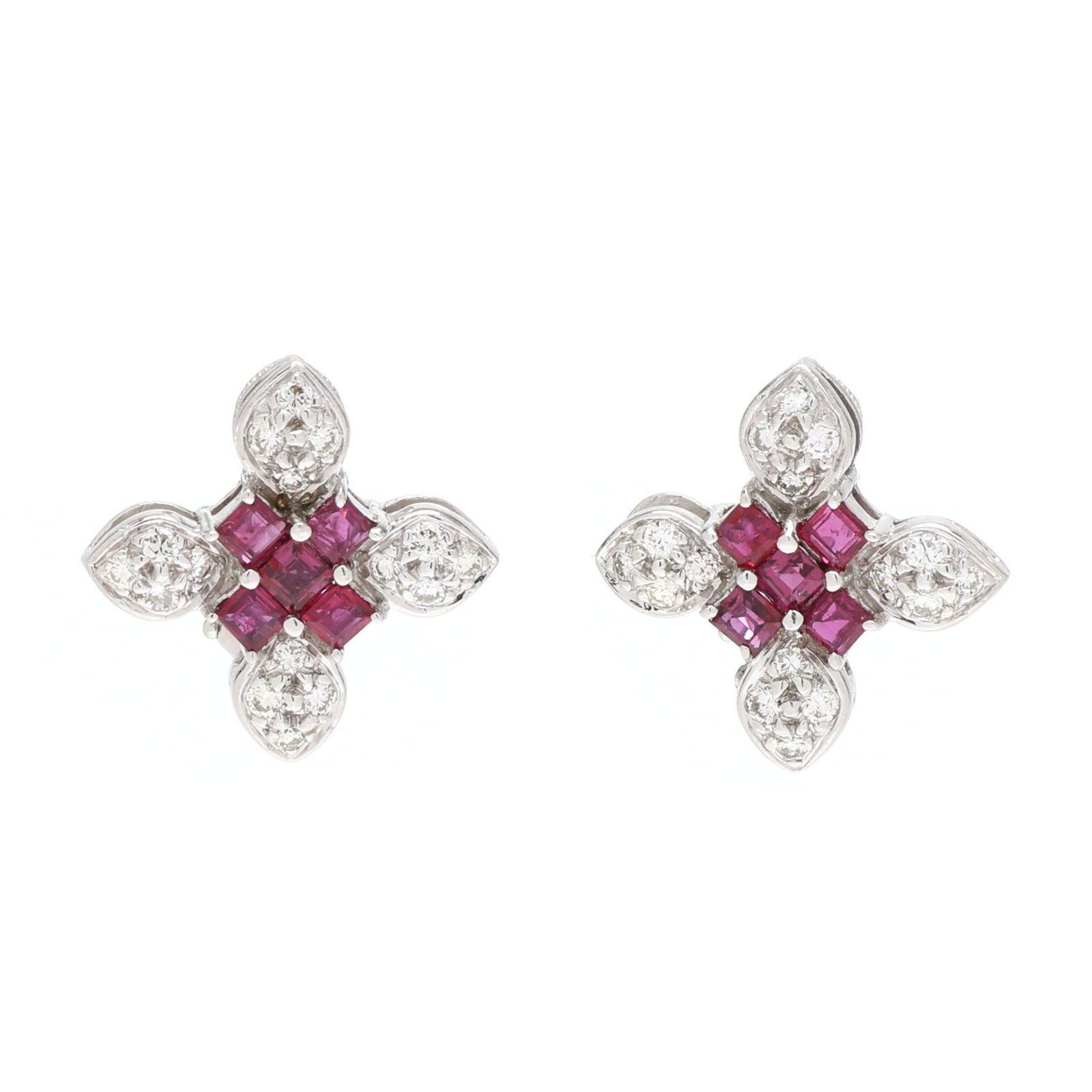 White Gold, Ruby, and Diamond Earrings: White Gold, Ruby, and Diamond Earrings the earrings in a quatrefoil design, centered on prong set square cut rubies in a cross formation and pavé set full cut round diamond melee to each petal,