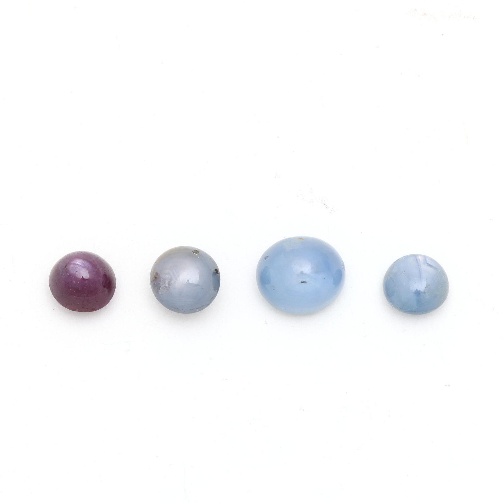 Group of Three Star Sapphires and A Star Ruby (1 of 3)