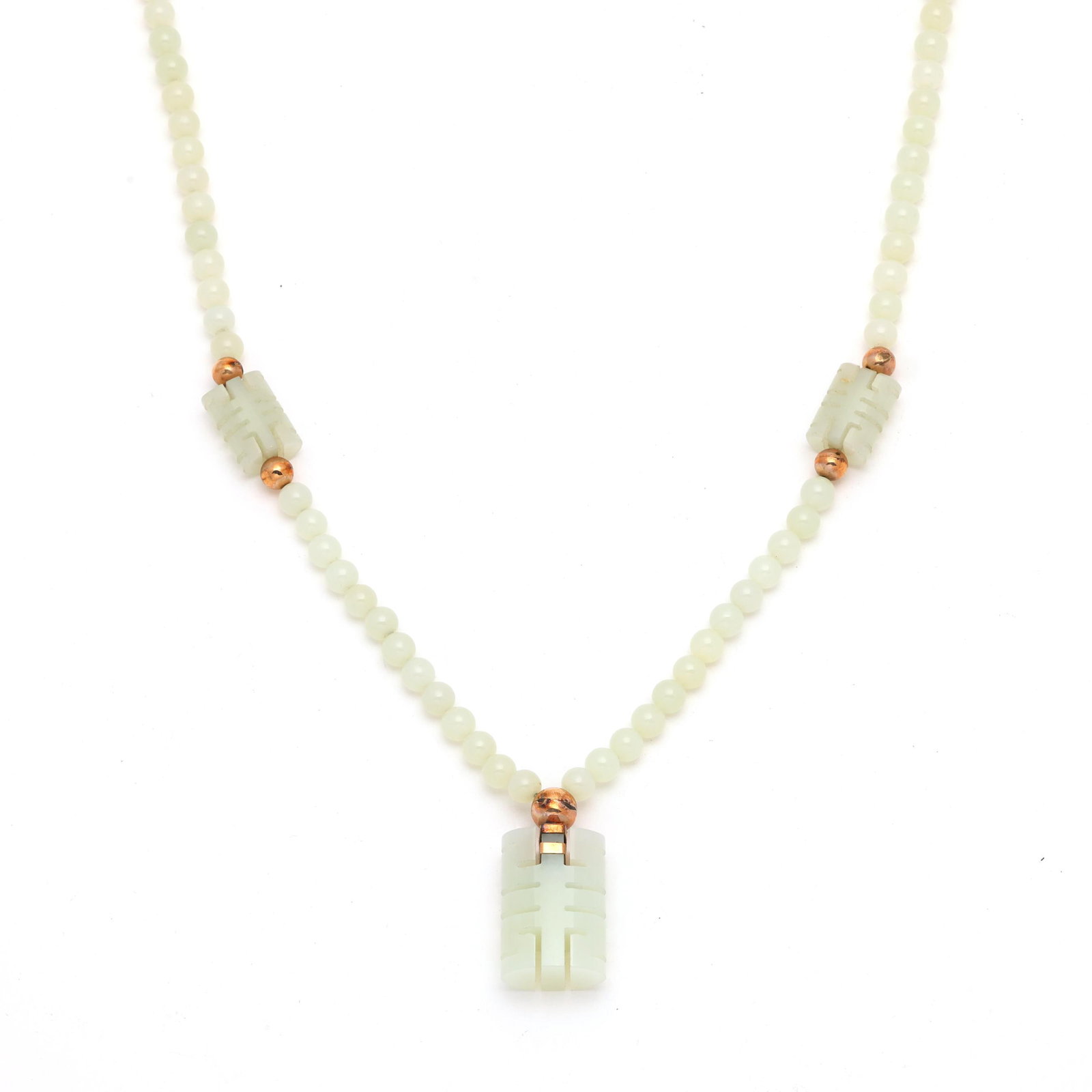 Gold and Nephrite Jade Bead Necklace: Gold and Nephrite Jade Bead Necklace strung with round nephrite jade beads, gold beads, and carved nephrite jade stations, suspending a carved nephrite jade pendant, gold XRF testing 10KT. Accompanied