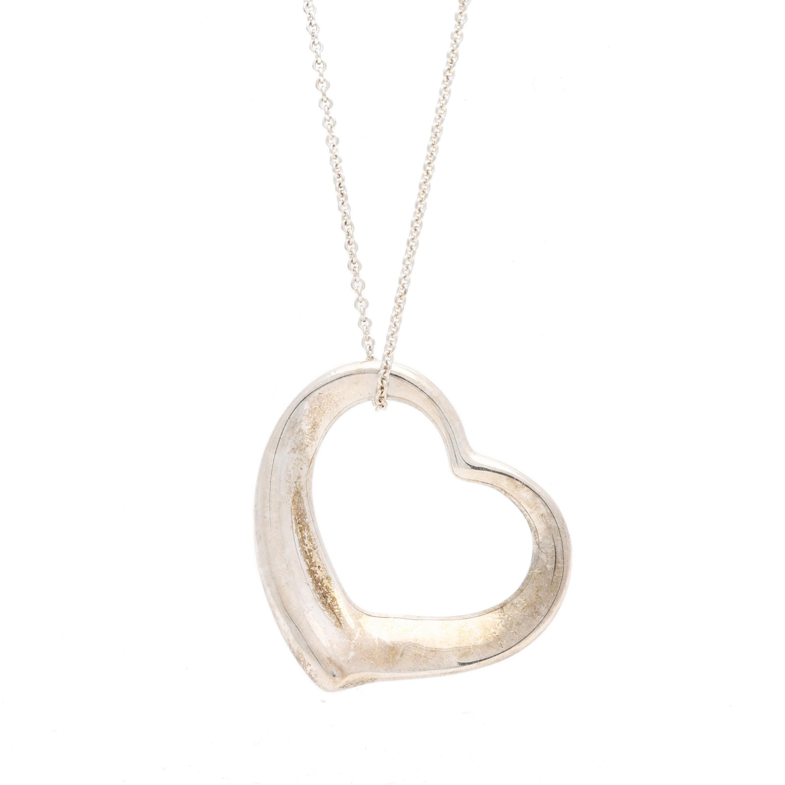 Silver Open Heart Necklace, Elsa Peretti for Tiffany & Co.: Silver Open Heart Necklace, Elsa Peretti for Tiffany & Co. an open heart pendant (1.5 x 1 15/16 in.), suspended from a cable link chain completed with a spring ring clasp, signed and stamped
