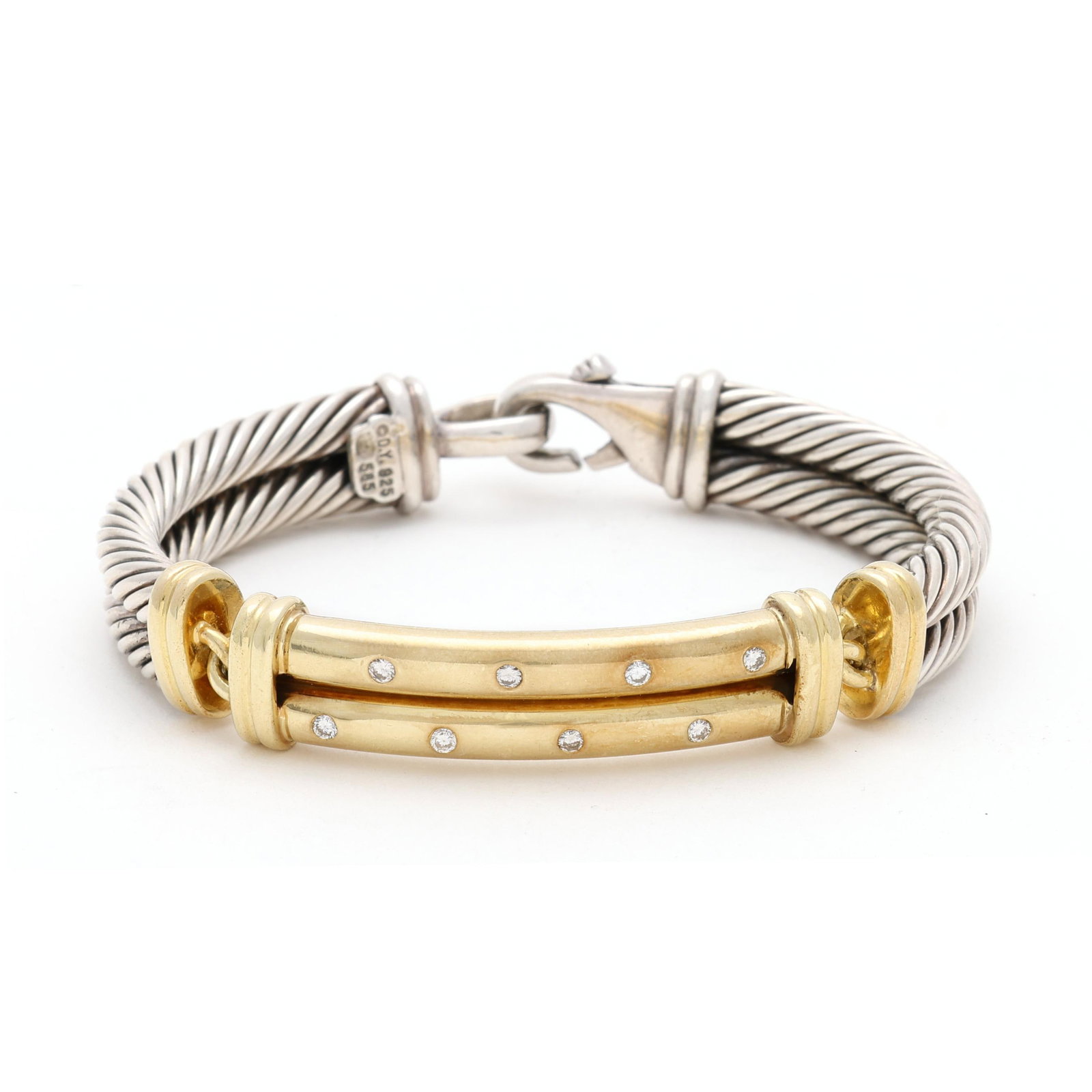 Silver, Gold, and Diamond Bracelet, David Yurman: Silver, Gold, and Diamond Bracelet, David Yurman in three part design with a double cable motif, the center link in gold and flush set with full cut round diamond melee, completed with a lobster