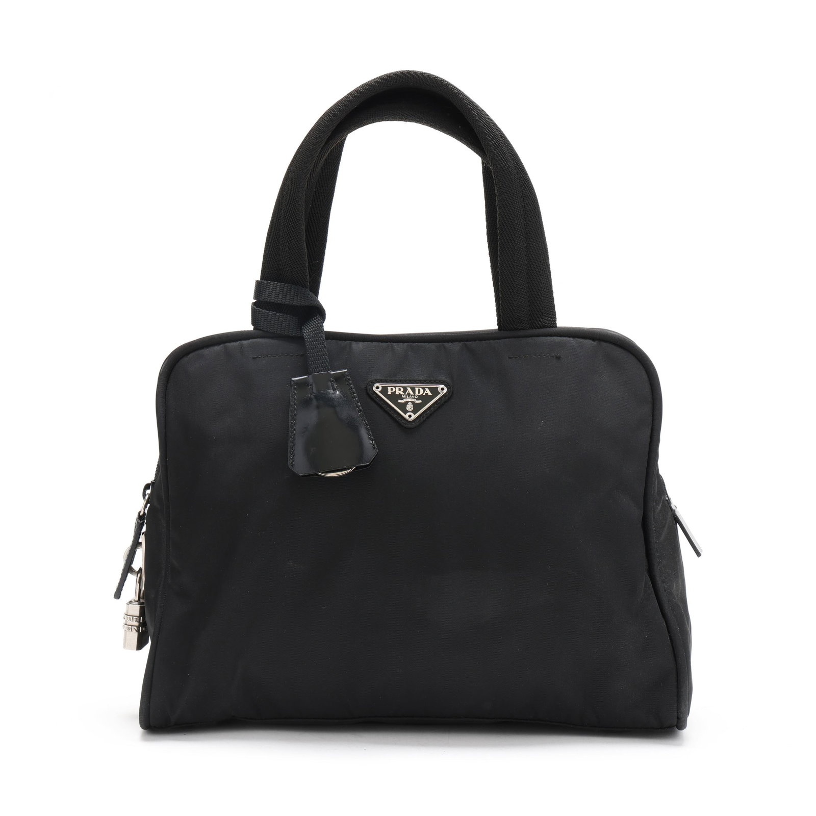Black Nylon Tote Bag, Prada: Black Nylon Tote Bag, Prada made in Italy of black nylon fabric, black woven fabric top handles, silver-tone hardware, leather zipper pull, and metal brand tag, with brand-stamped combination lock and