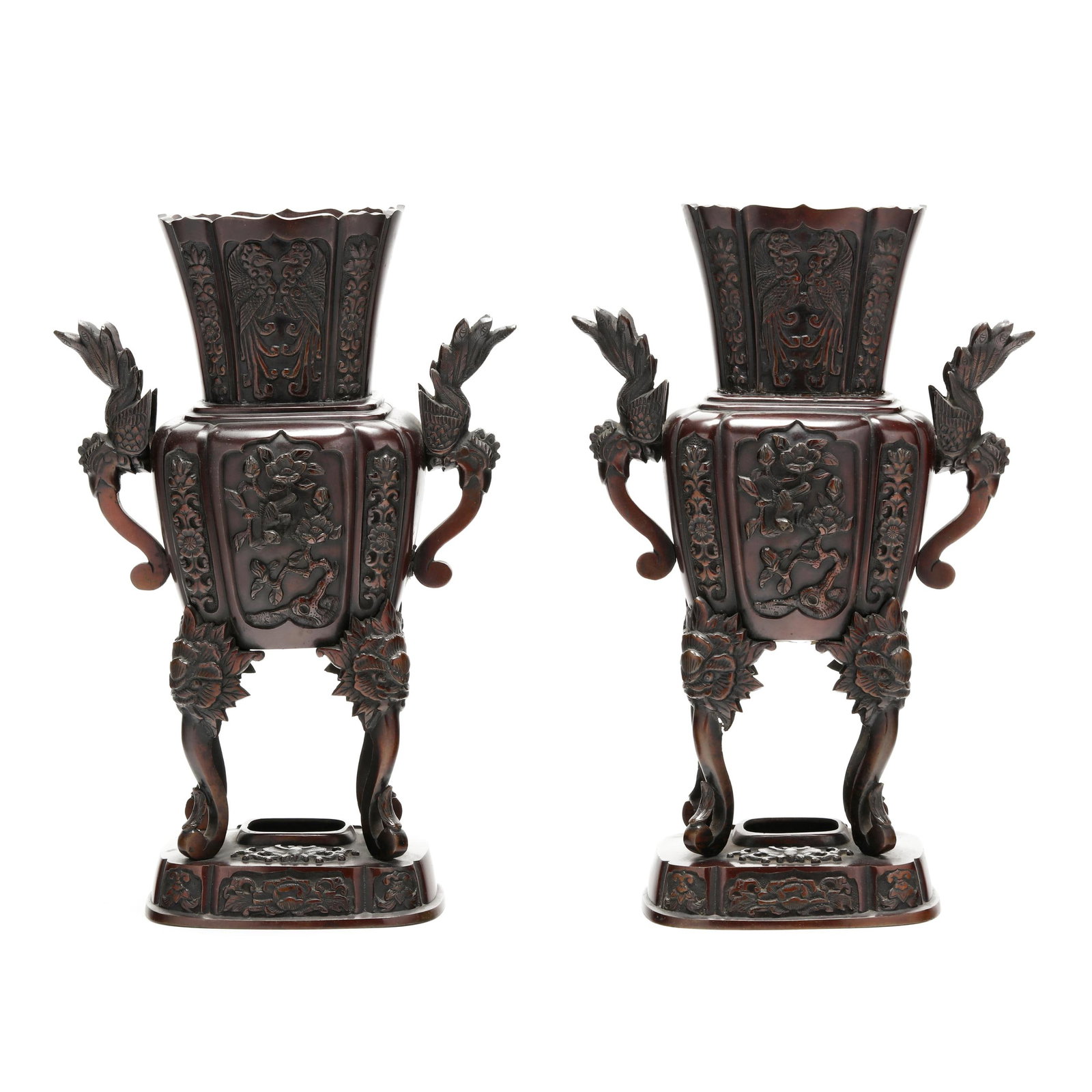 A Pair of Chinese Patinated Bronze Altar Censers: A Pair of Chinese Patinated Bronze Altar Censers late Qing dynasty or early Republic period, early 20th century, the pair cast in relief with phoenix handles, floral reserves, and scrolling foliate mo