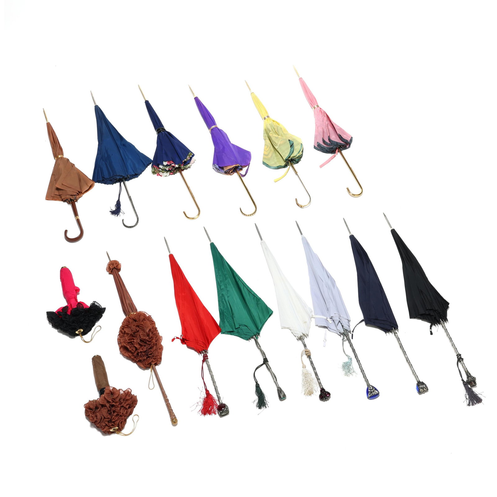 A Collection of (15) Vintage Parasols, Including Oscar Nailon, Nailon Rekord, and Lilion EPG: A Collection of (15) Vintage Parasols, Including Oscar Nailon, Nailon Rekord, and Lilion EPG mid-20th century, the first (6) with ornate Victorian style silver toned metal handles, mounted in faceted 