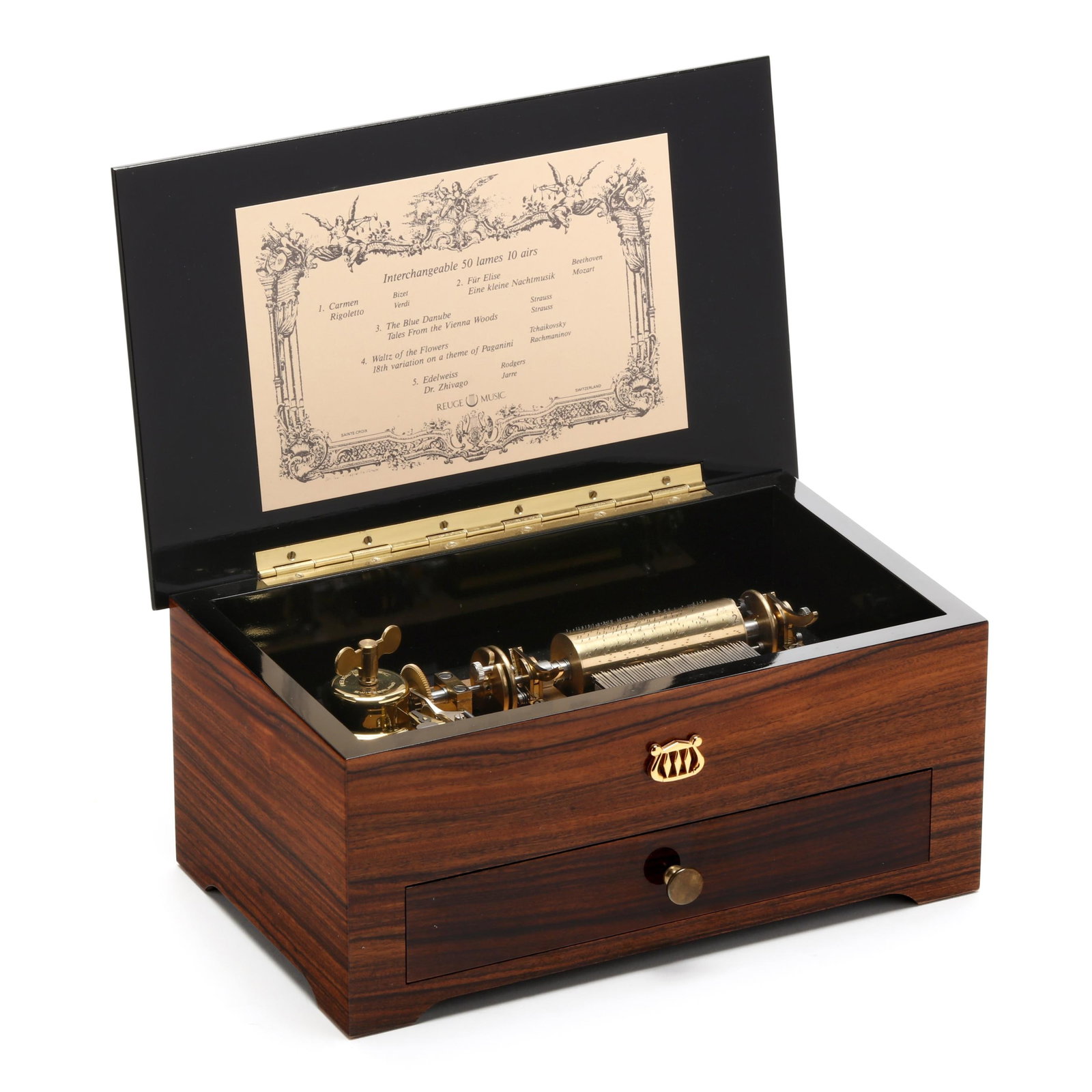 Contemporary Reuge Music Box, Sainte-Croix, Switzerland: Contemporary Reuge Music Box, Sainte-Croix, Switzerland the serial number 322 is stamped on the bedplate; the rosewood cabinet has an inlaid lid and applied golden lyre; the comb plays beautifully wit