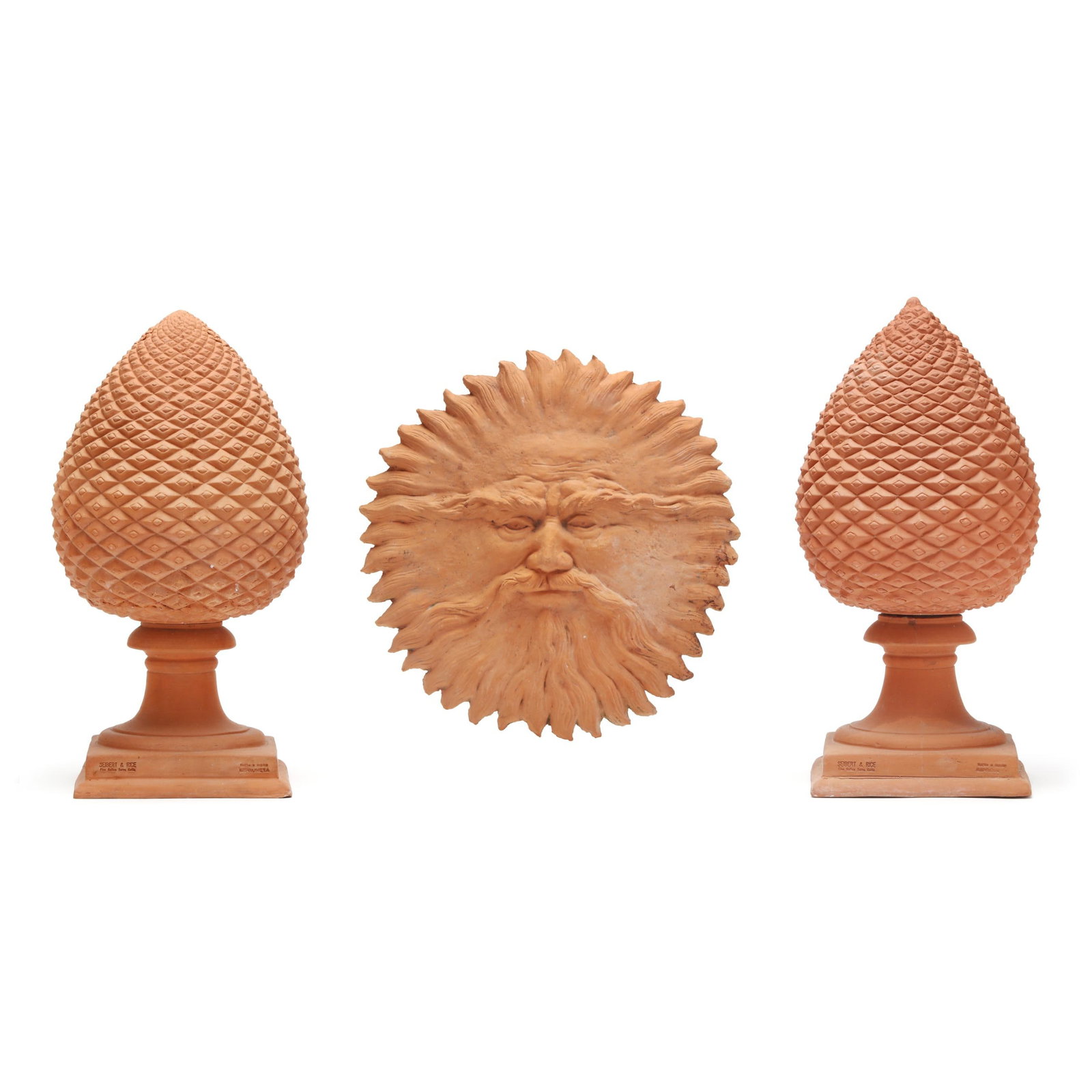 Pair of Italian Terracotta Pinecone Pedestal Ornaments and Sun Face: Pair of Italian Terracotta Pinecone Pedestal Ornaments and Sun Face late 20th century, including a pair of impruneta pinecone forms each with separate bases, stamped with impruneta marks along with