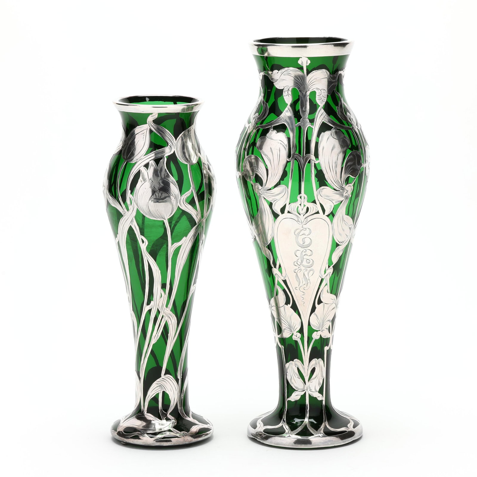 Two Art Nouveau Sterling-Silver Deposit Emerald Green Glass Vases: Two Art Nouveau Sterling-Silver Deposit Emerald Green Glass Vases early 20th century, attributed Steuben blanks, floral silver deposit, the larger with monogrammed cartouche, the silver appears unmark