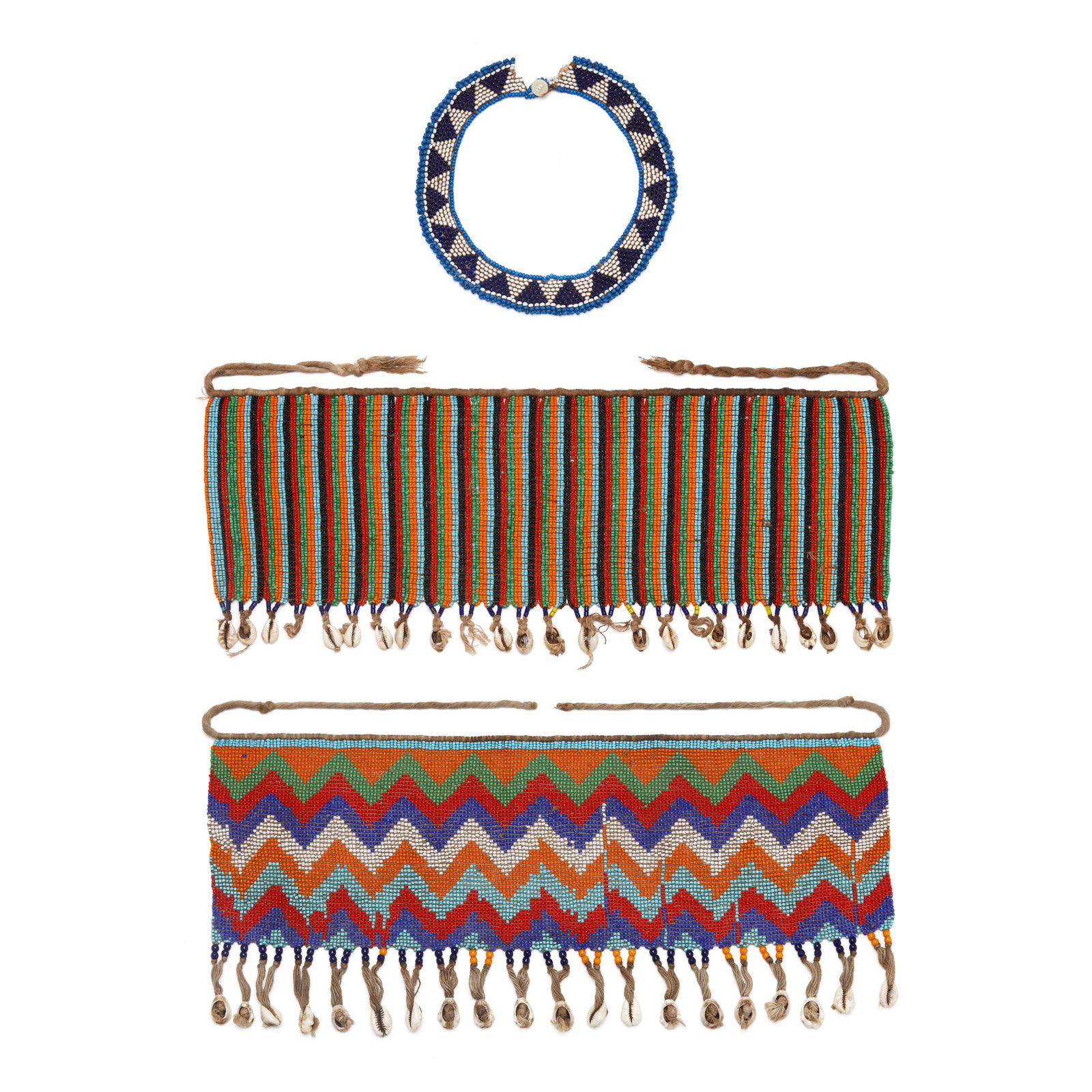 Two African Kirdi Beaded Aprons and Kuba Necklace: Two African Kirdi Beaded Aprons and Kuba Necklace mid-late 20th century, the Kirdi Aprons hand-made of cotton string textile, colored glass beads, and cowrie shell fringe, Cameroon (or vicinity), unma