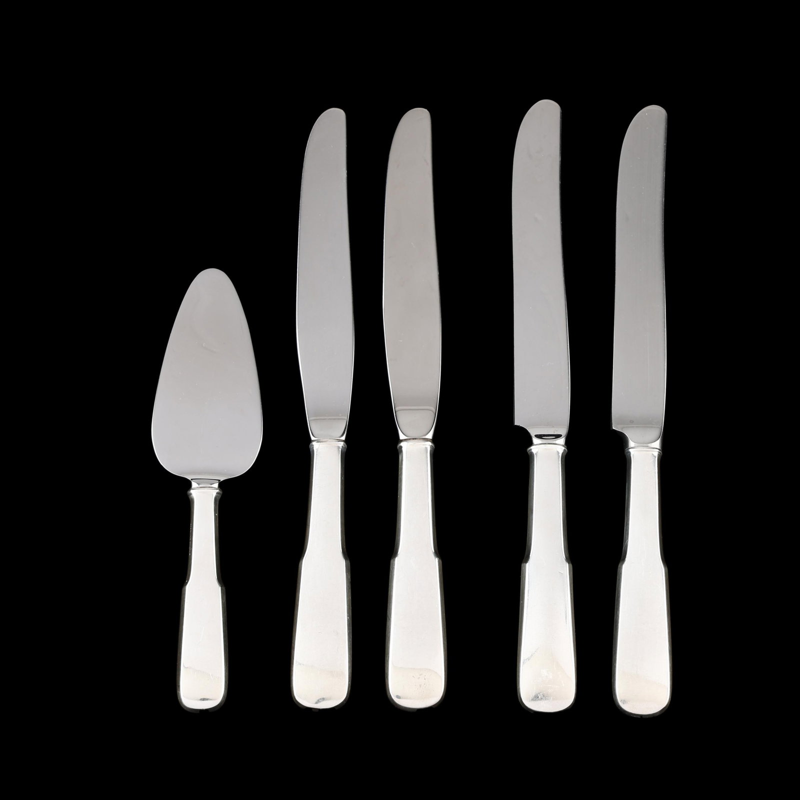 Five International 1810 Sterling Silver Knives: Five International 1810 Sterling Silver Knives includes (4) dinner knives (8 3/4 in.) and a cheese knife (6 1/4 in.); not monogrammed. Additional high-resolution photos are available at www.lelandlitt