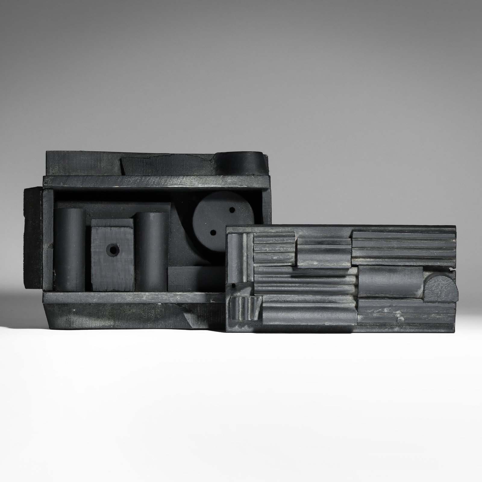Louise Nevelson (American, 1899-1988), Black Cryptic XXVIII, 1979: Louise Nevelson (American, 1899-1988), Black Cryptic XXVIII, 1979 wood painted black, box form with sliding lid, retaining Pace Gallery and Makler Gallery labels to the verso. 5 1/4 x 7 1/2 x 3 1/2 in