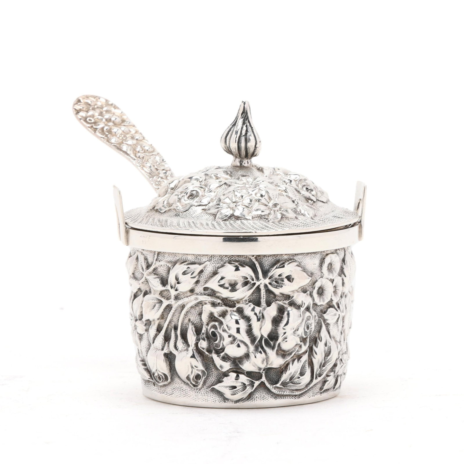 The Stieff Company Sterling Silver Repousse Mustard Pot and Spoon: The Stieff Company Sterling Silver Repousse Mustard Pot and Spoon Baltimore, early 20th century, pattern number 47, the basket form pot with a cover allover decorated in hand-chased floral motifs,
