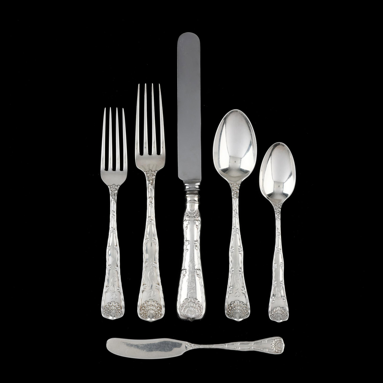 Tiffany & Co Wave Edge Sterling Silver Flatware Service: Tiffany & Co Wave Edge Sterling Silver Flatware Service period mark circa 1873-1891, directorship of Edward Moore, (90) pieces to include: (10) dinner knives (10 1/8 in.); (13) dinner forks (8 in.); (