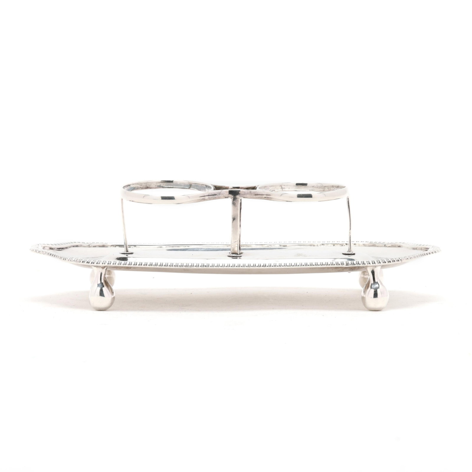 George III Silver Ink Stand, Mark of Thomas Freeth I: George III Silver Ink Stand, Mark of Thomas Freeth I London (1808), featuring an egg and dart rim over oblong ball feet; not monogrammed. 2 x 7 1/2 x 3 3/4 in. 6.2 troy oz. Additional high-resolution 