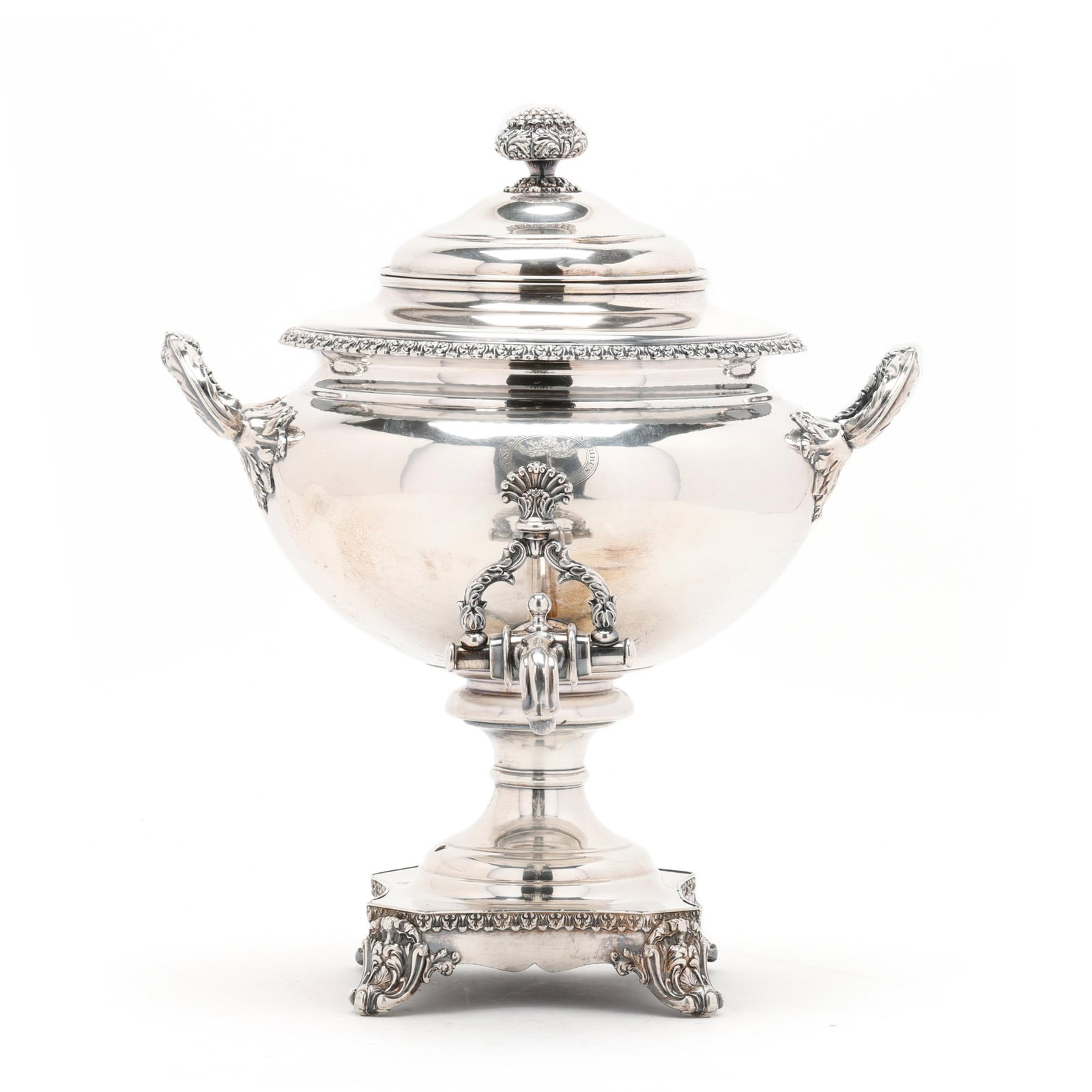 Georgian Silver-Plated Hot Water Urn: Georgian Silver-Plated Hot Water Urn early 19th century, with an acanthus leaf finial, conforming decoration to the rim, base, and double handles, raised over a shaped pedestal foot with cartouche fee