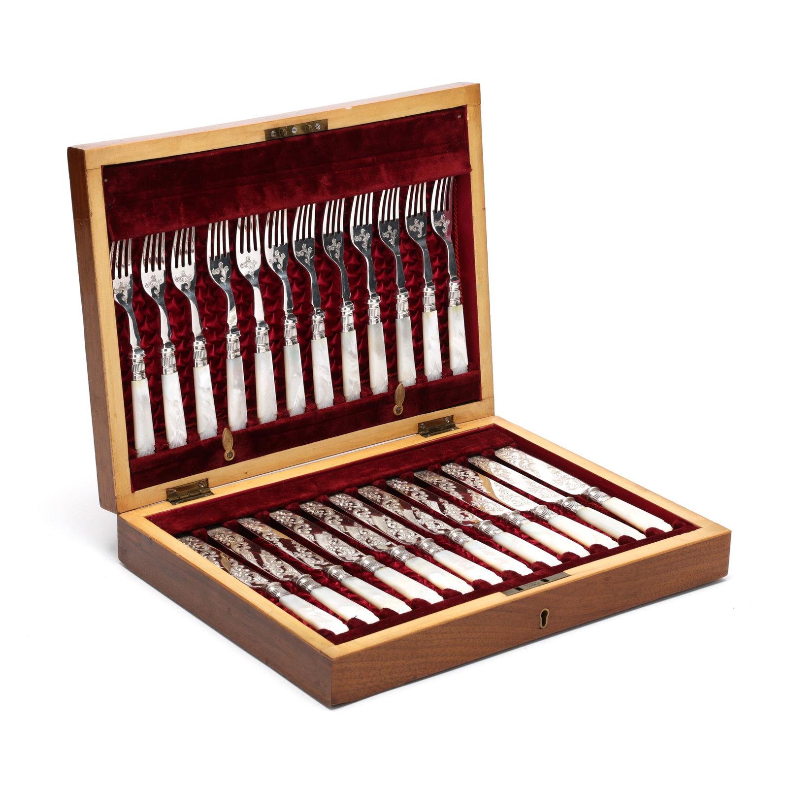 Cased Edwardian Silver and Mother of Pearl Fruit Set for Twelve: Cased Edwardian Silver and Mother of Pearl Fruit Set for Twelve early 20th century, with silver balusters, mark of William Yates, Sheffield (1909); the blades with silver-plated mark of M W & S; each 