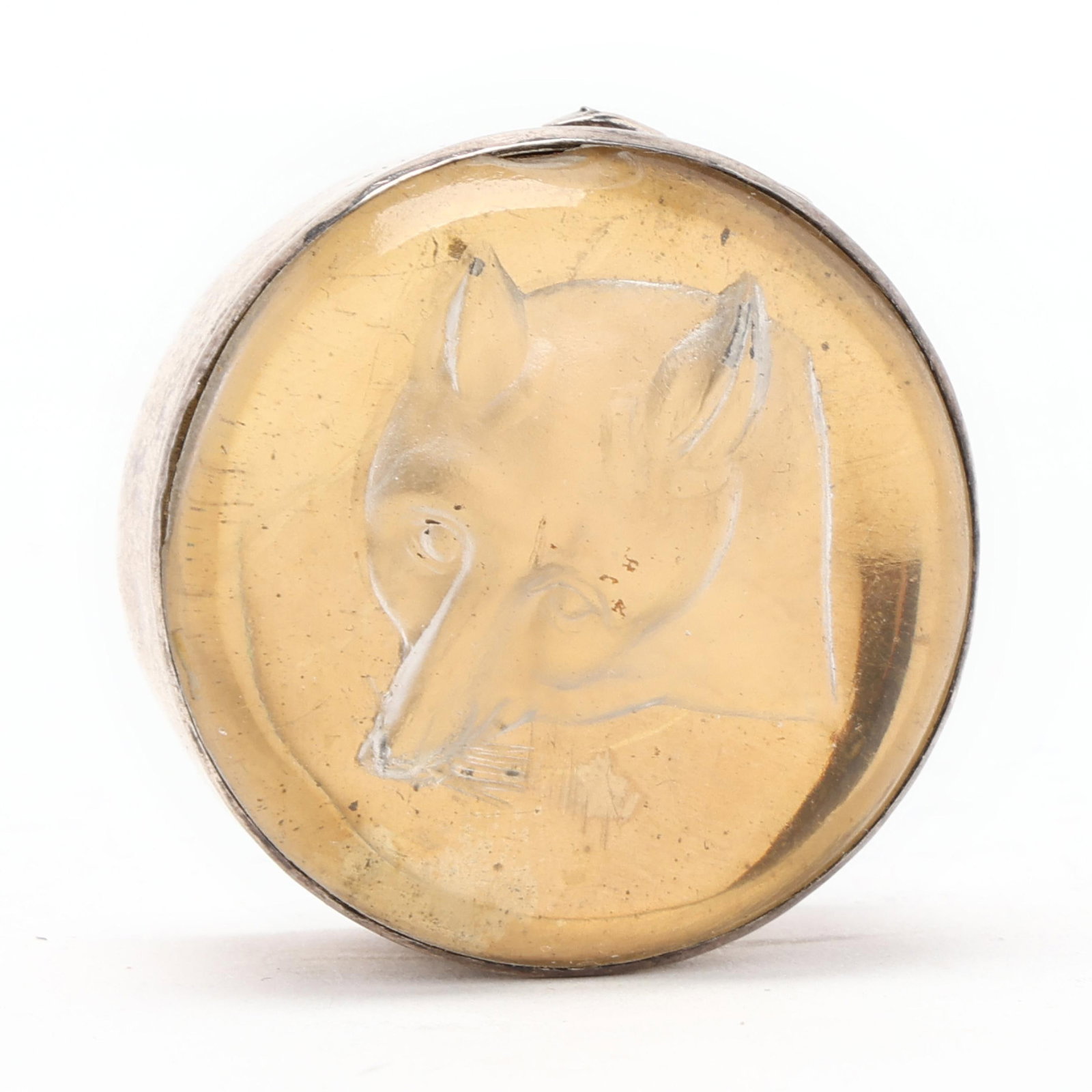 An Edwardian Silver and Glass Fox Head Pill or Snuff Box: An Edwardian Silver and Glass Fox Head Pill or Snuff Box early 20th century, worn London hallmarks, likely Stuart Clifford & Co. of Grosvenor Square, London W, round form with reverse cut glass fox he