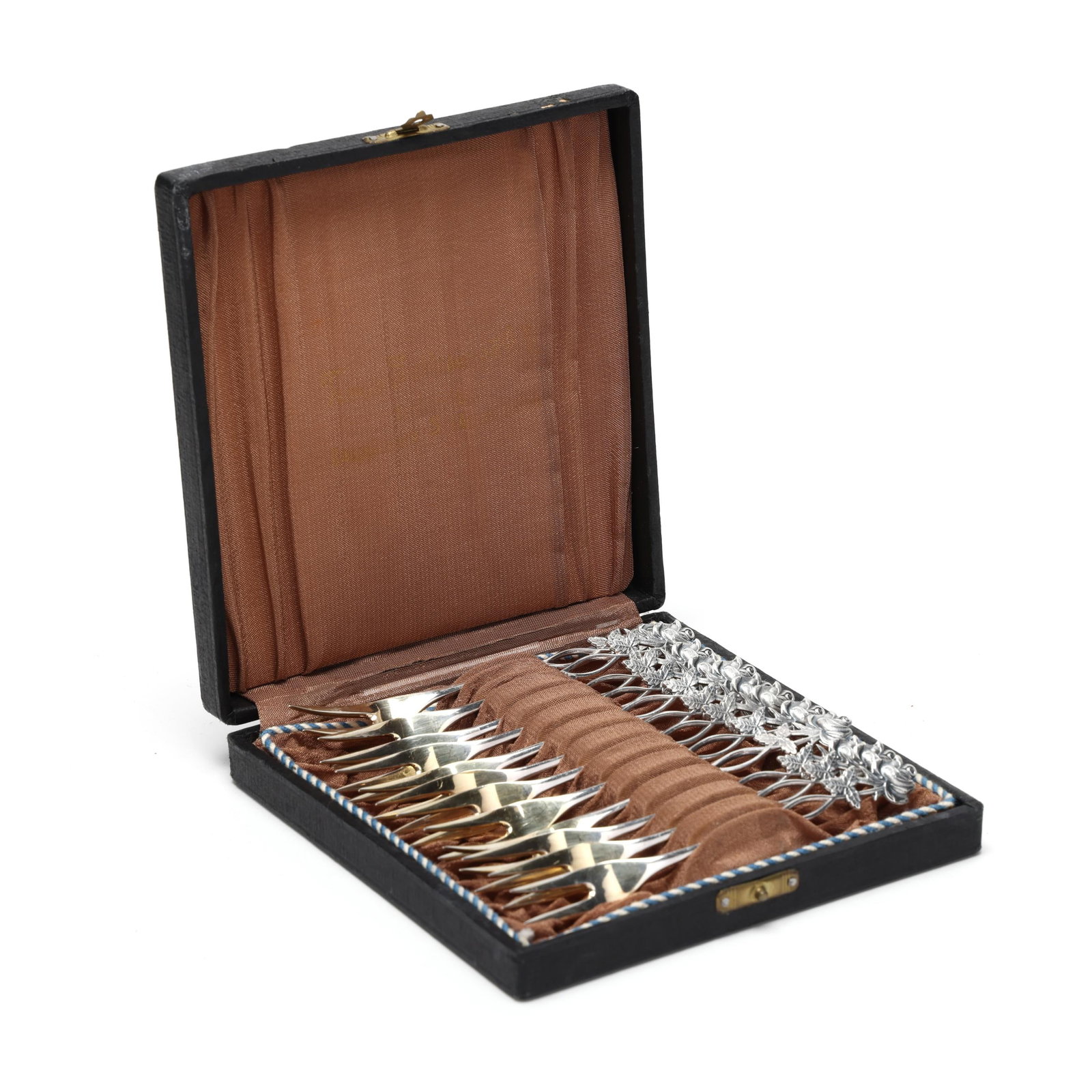 Cased Set of Twelve Finnish Silver Fruit Forks: Cased Set of Twelve Finnish Silver Fruit Forks 1949, .813 silver, featuring a rose handle and gold wash tines; not monogrammed, presented in the original fitted retail case. Each fork 4 3/4 in.; Case