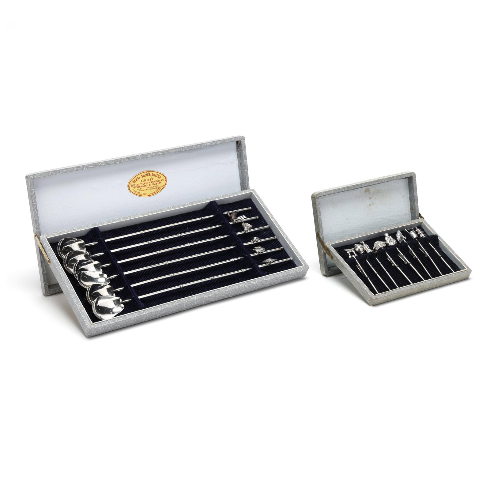 Set of Japanese Sterling Silver Stirring Straws and Cocktail Picks: Set of Japanese Sterling Silver Stirring Straws and Cocktail Picks 20th century, includes a set of (6) bamboo stirring straws and (8) cocktail picks, all marked "Sterling", with various symbolic