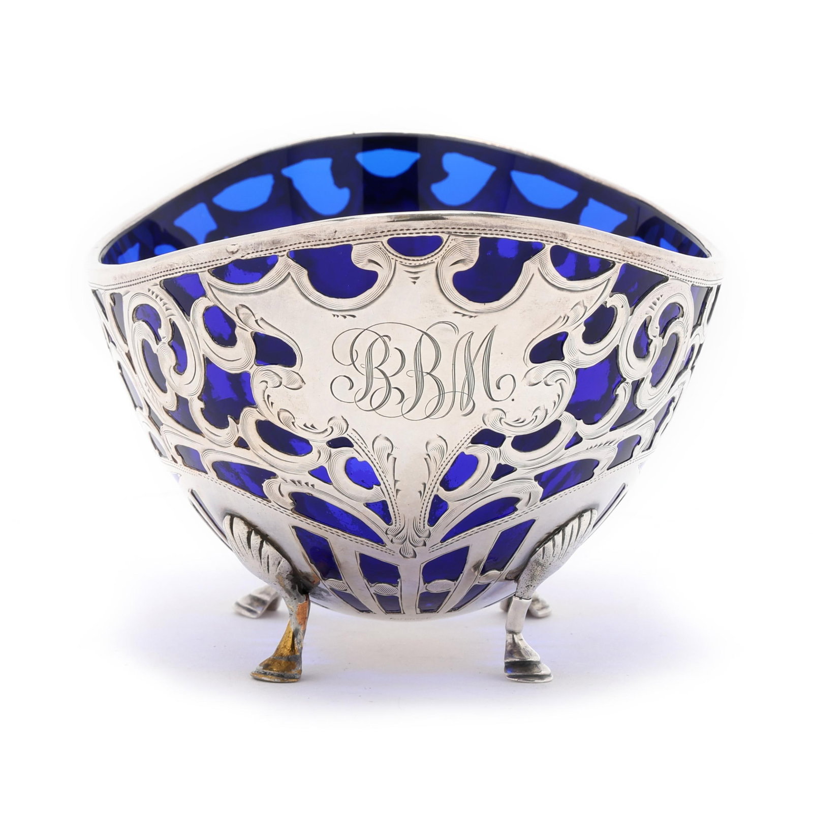 Silver Deposit Cobalt Glass Bon Bon Bowl: Silver Deposit Cobalt Glass Bon Bon Bowl early 20th century, cobalt blue blown glass deposited with silver by Alvin, pattern number B1061, marked "Fine 950/1000", the form with engraved openwork rocai