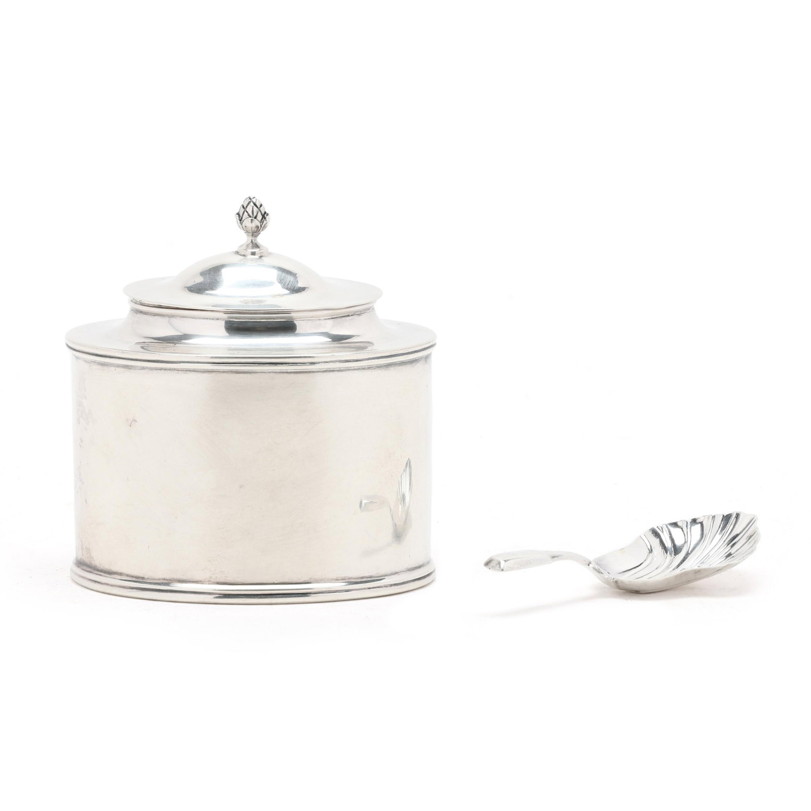 American Sterling Silver Tea Caddy & Victorian Silver Caddy Spoon: American Sterling Silver Tea Caddy & Victorian Silver Caddy Spoon the tea caddy, early 20th century, retail mark of David R. Rough, New York; pattern number 700, with a pine cone finial, not monogramm