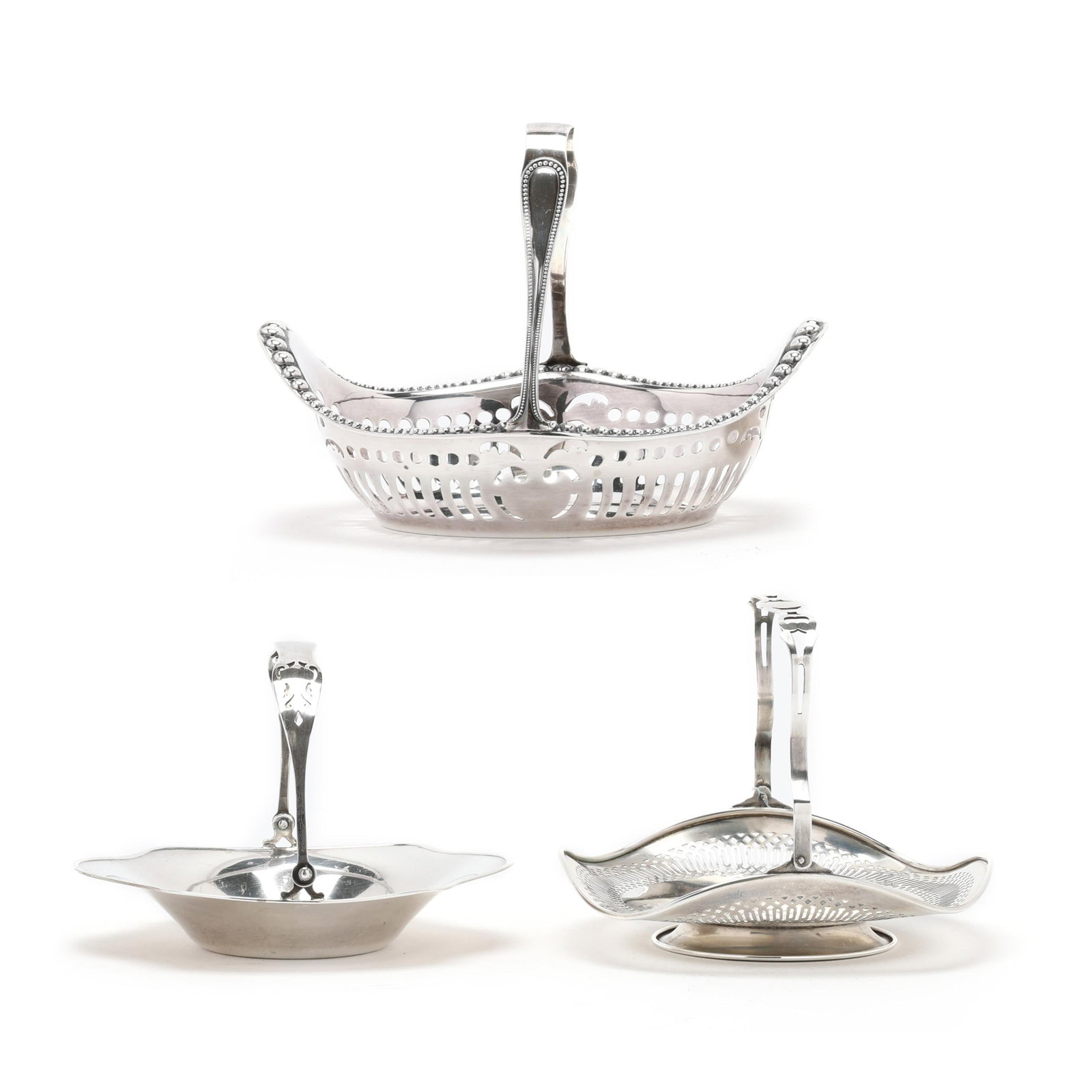 Three American Sterling Silver Baskets: Three American Sterling Silver Baskets the largest, mark of Gorham, pattern number A2078, featuring a graduated bead course rim, reticulated body, and fixed handle with "F" monogram (5 1/2 x 7 1/2 x 5