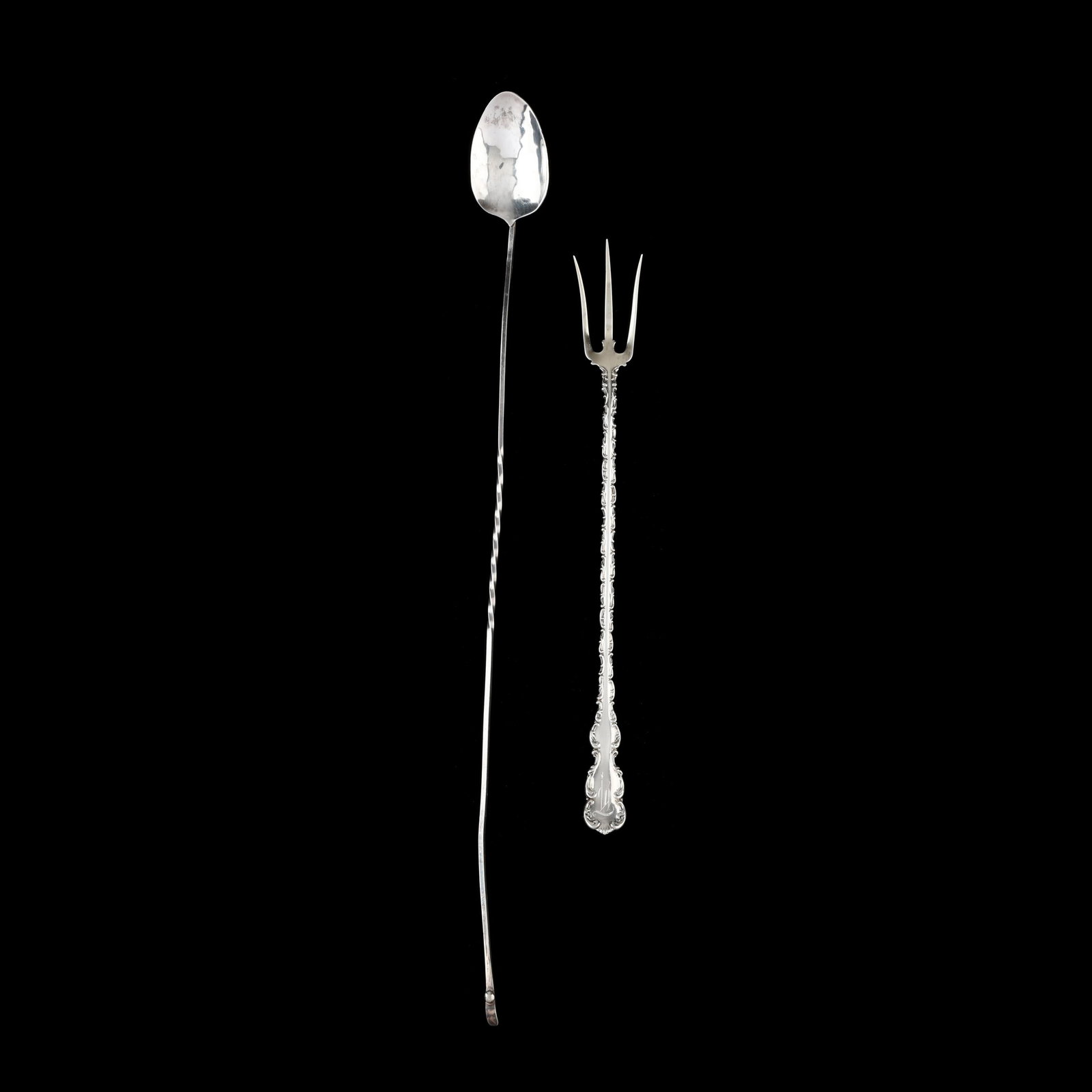 Two Long Handled Silver Flatware Servers: Two Long Handled Silver Flatware Servers includes a silver claret stirrer, mid-20th century, twisted handle, not marked or monogrammed; and a Whiting Louis XV sterling silver long handle fork with