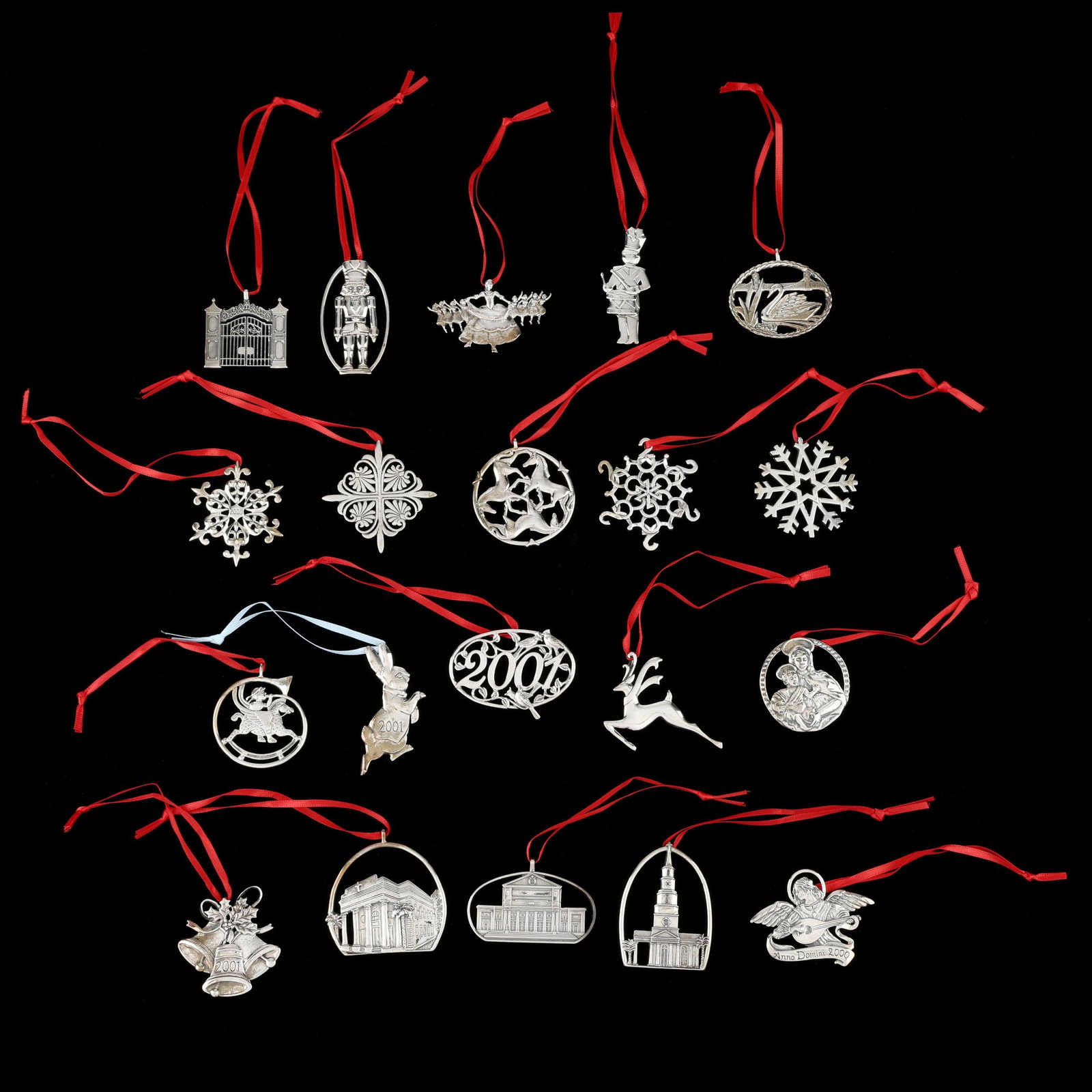 Twenty Hand & Hammer Sterling Silver Christmas Ornaments: Twenty Hand & Hammer Sterling Silver Christmas Ornaments most are from 2000 and 2001, various motifs including snowflakes, figures, and architecture, all marked, not monogrammed. Presented in a