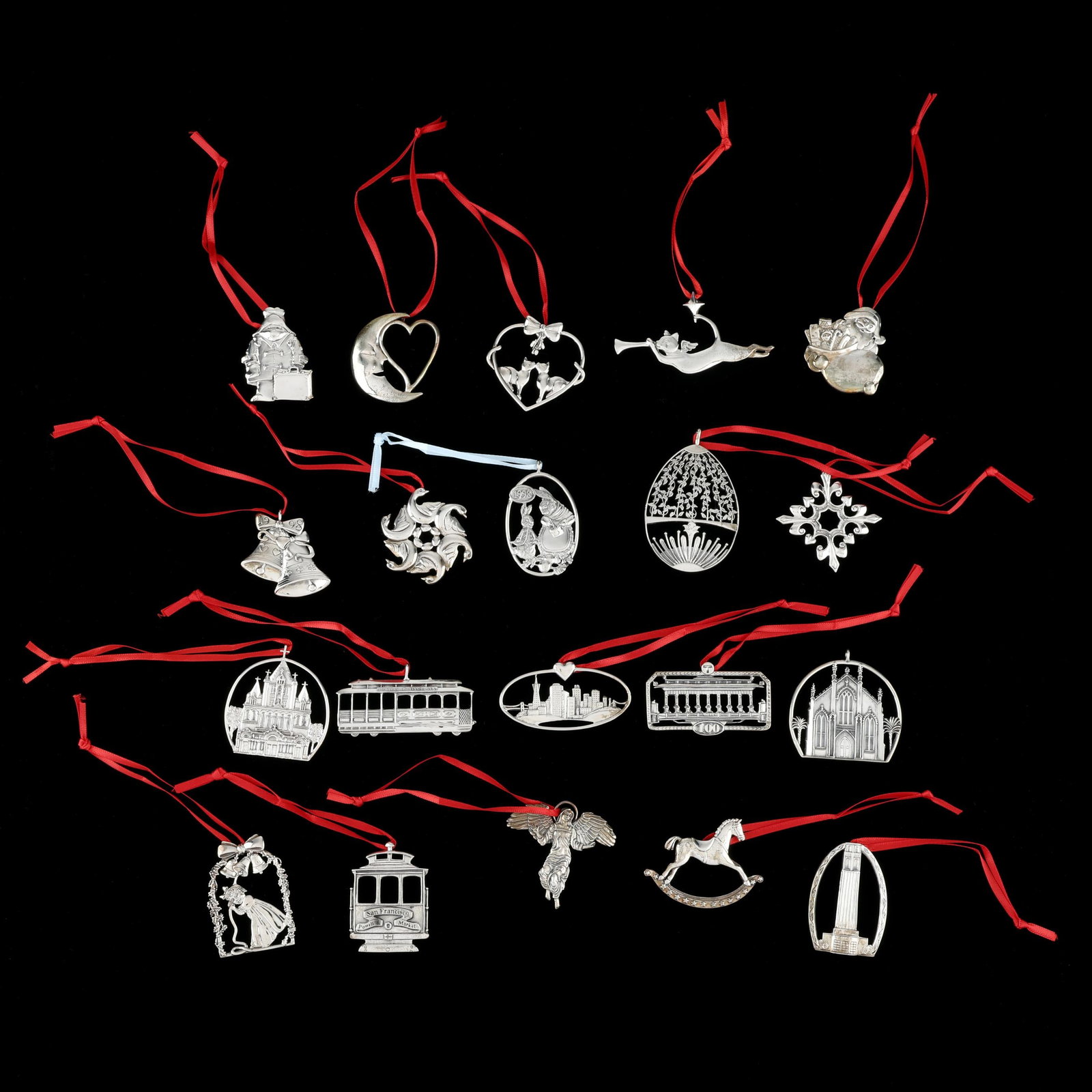 Twenty Hand & Hammer Sterling Christmas Ornaments: Twenty Hand & Hammer Sterling Christmas Ornaments late 20th and early 21st century, includes various motifs such as train cars, cats, and holiday symbols; all marked, presented in a fitted case, not