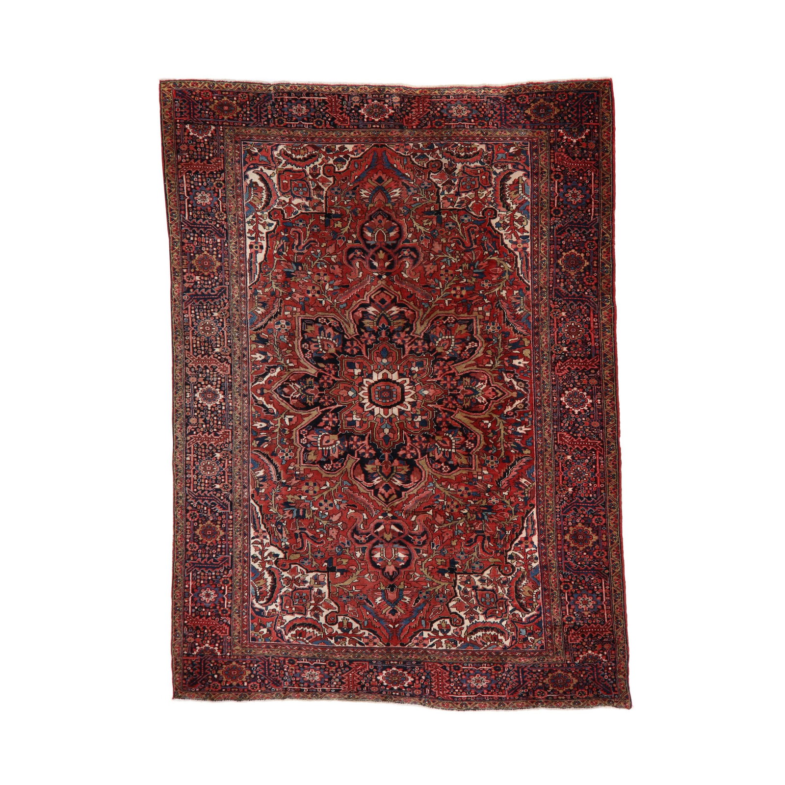 Heriz Room Size Carpet: Heriz Room Size Carpet wool on cotton foundation, the central lobed starburst medallion on a red field filled with floral and foliate motifs, the cream spandrels with floral and foliate motifs, the wi