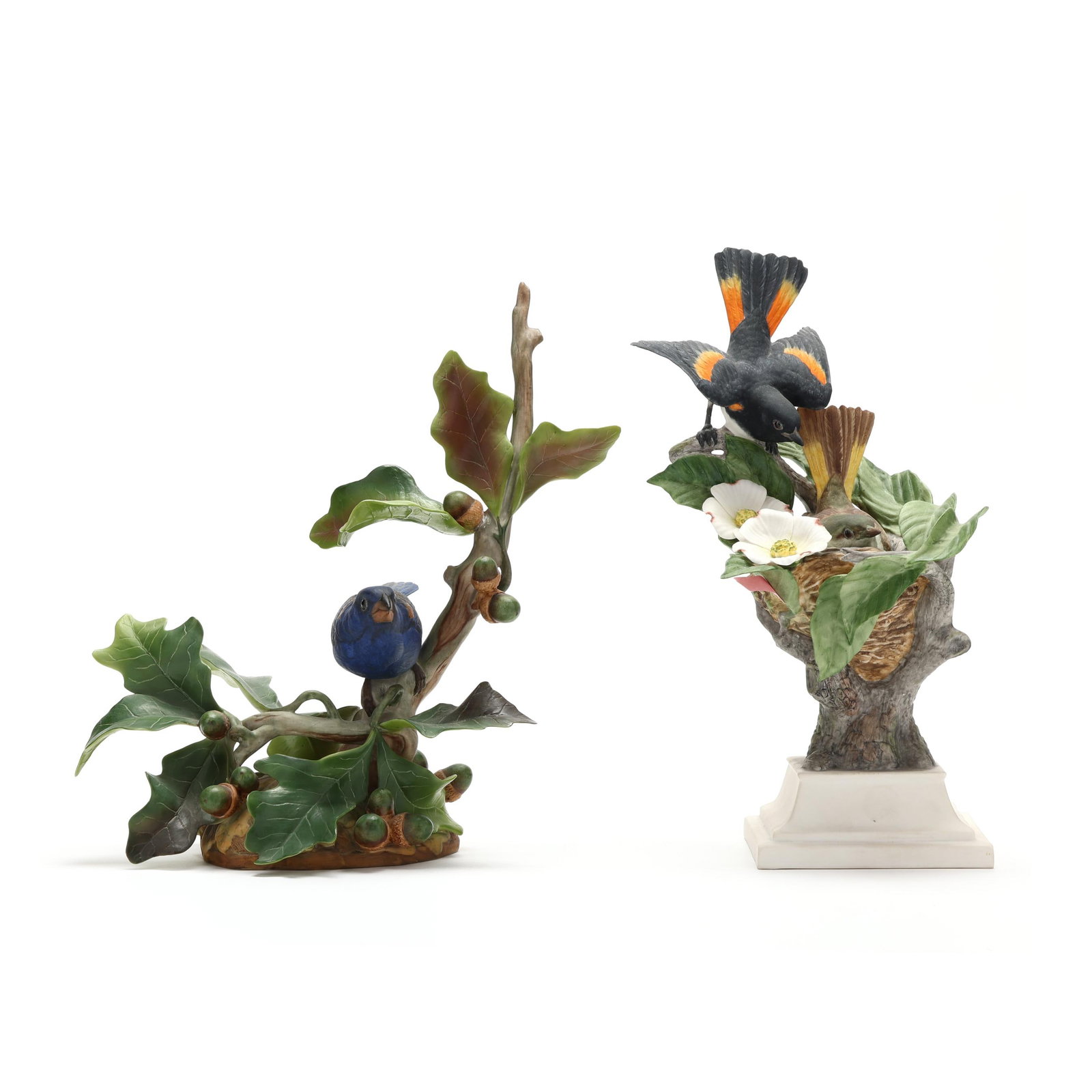 Boehm, Two Limited Edition Porcelain Bird Sculptures: Boehm, Two Limited Edition Porcelain Bird Sculptures mid-20th century, made in the U.S.A., painted porcelain, to include: a Blue Grosbeak perching in an oak tree surrounded by acorns #489 (11 1/4 x 11