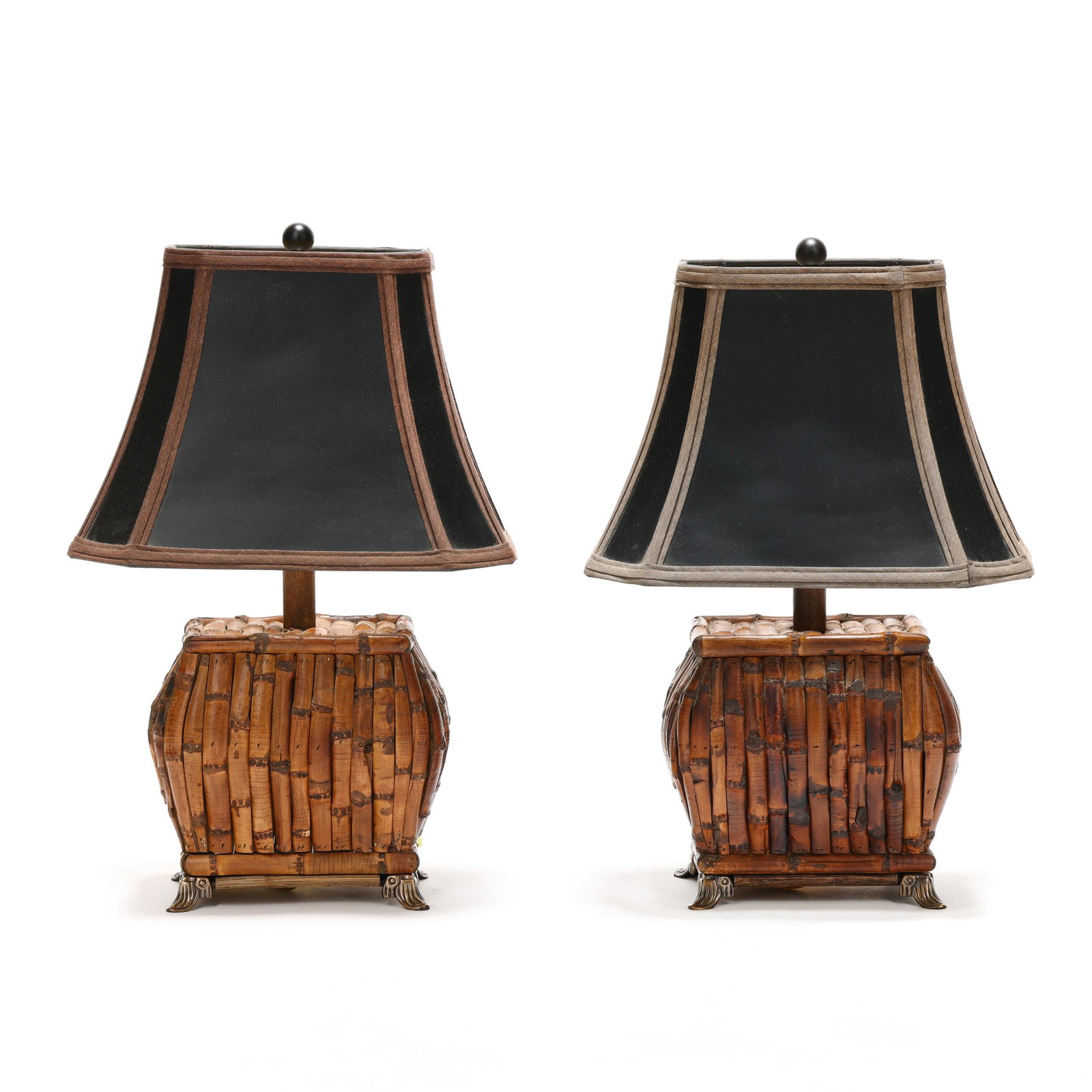 Pair of Chinoiserie Bamboo Table Lamps: Pair of Chinoiserie Bamboo Table Lamps late 20th century, both with convex rectangular bamboo body, raised on brass feet, supporting a single socket fixture with black and gilt shade, unmarked. 20 3/8