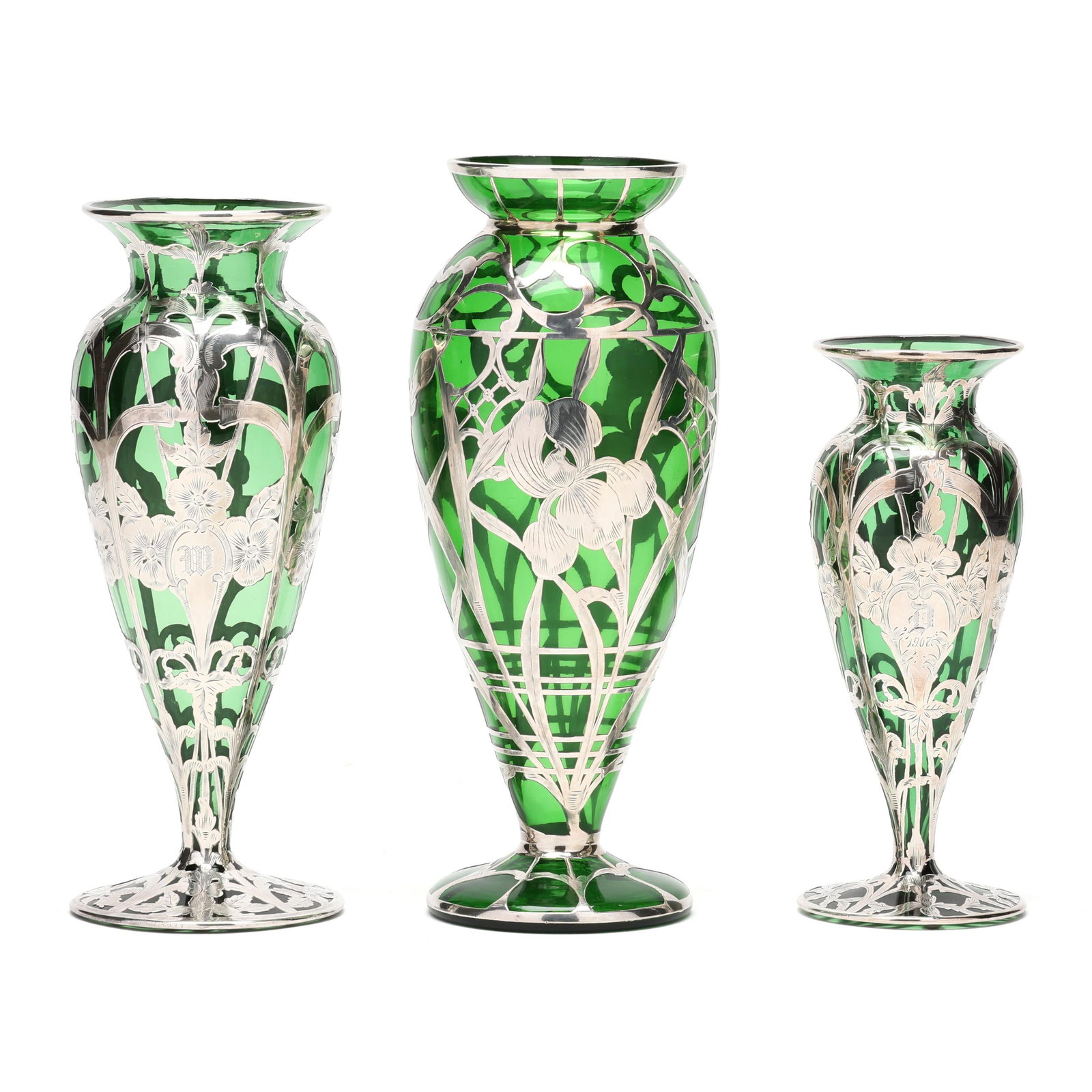 Three Large Art Nouveau Silver Deposit Green Glass Vases: Three Large Art Nouveau Silver Deposit Green Glass Vases early 20th century, attributed Steuben glass, allover floral hand chased silver, the largest vase featuring irises, marked sterling 10.5 in); t