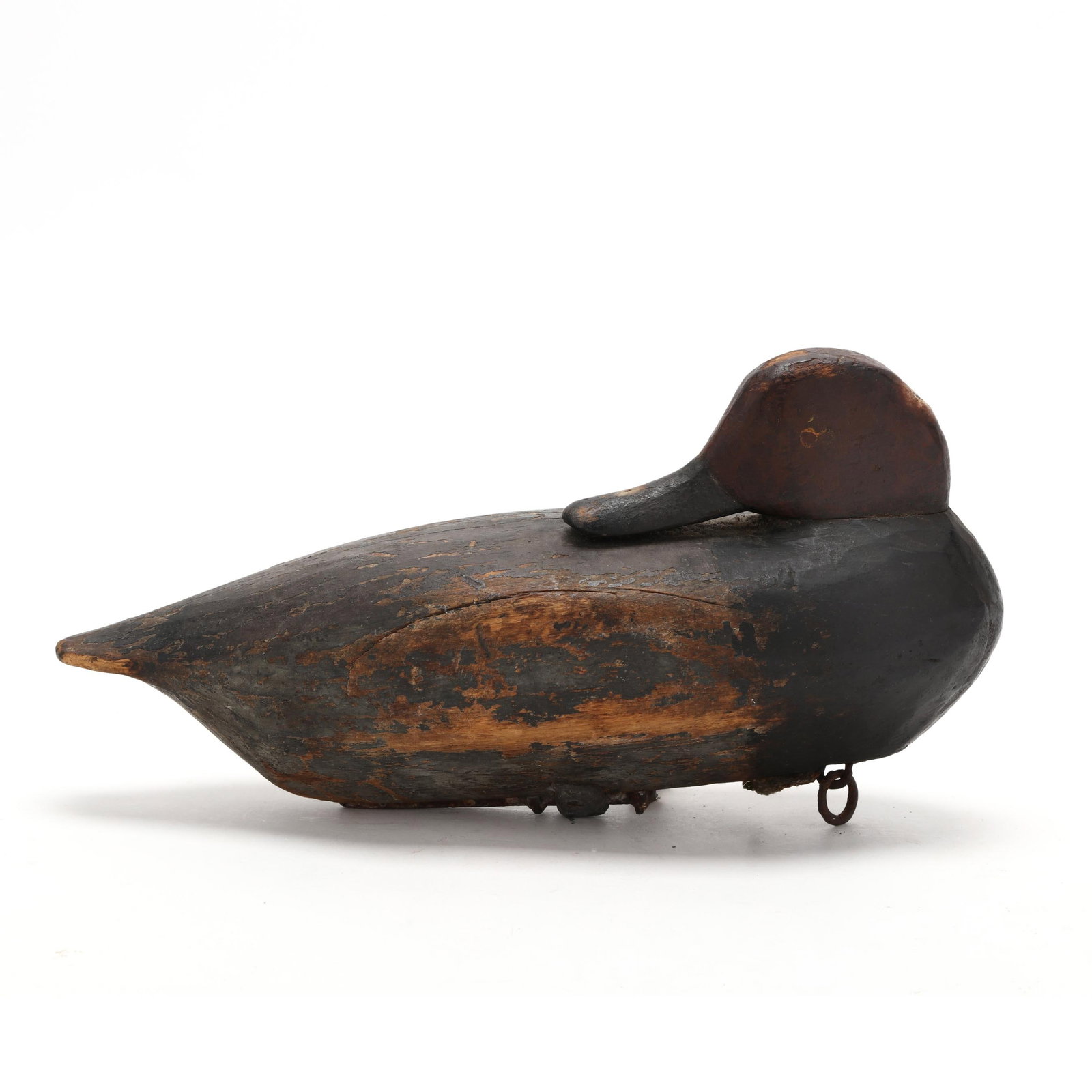 Luther Fulcher (NC, 1903-1935), Sleeping Redhead: Luther Fulcher (NC, 1903-1935), Sleeping Redhead Ocracoke, North Carolina, circa 1920s, carved and painted wood, unique spike ballast. Length 12.5 in. x 6.5 x 6. Additional high-resolution photos are 