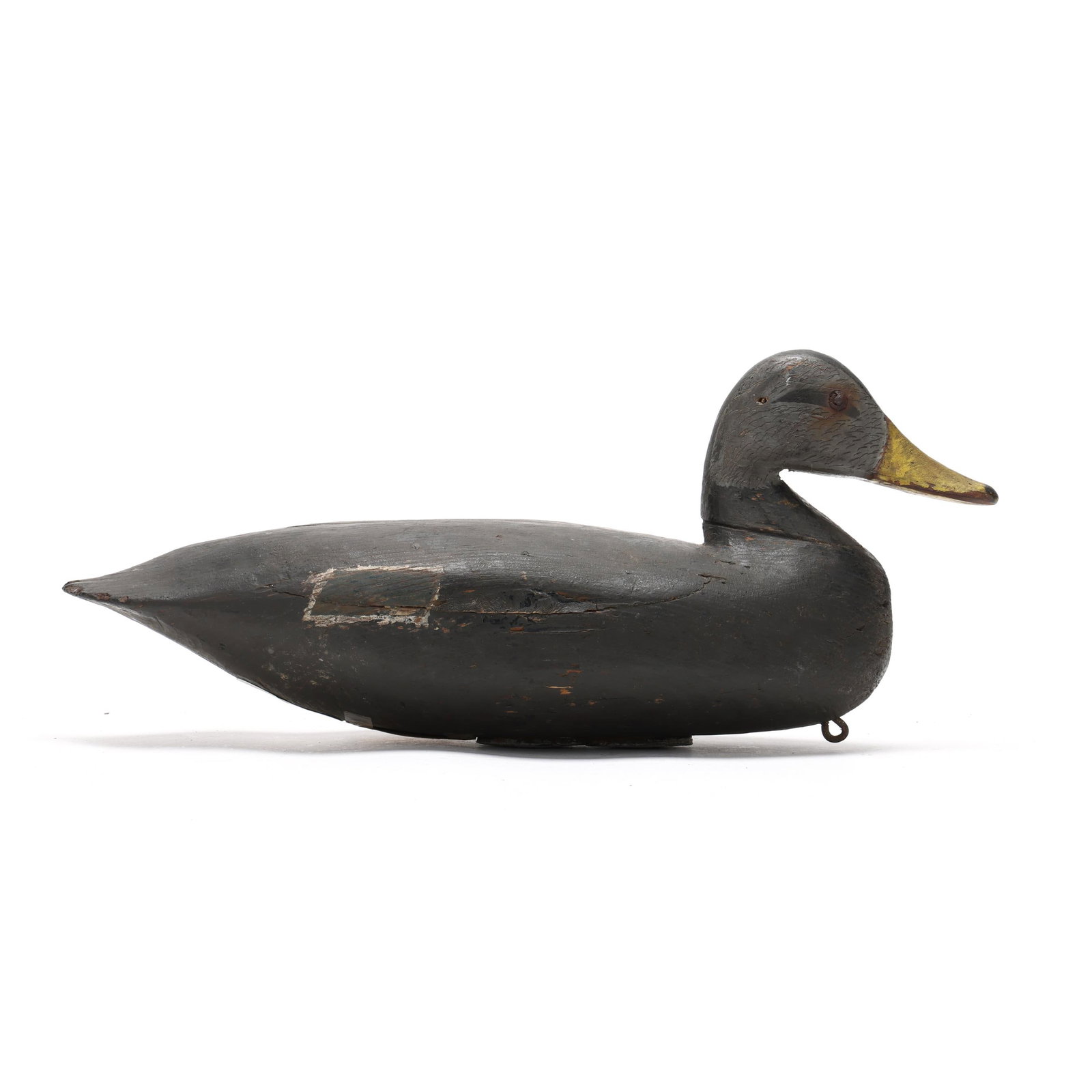 Charles Birch (VA, 1867-1956), Black Duck: Charles Birch (VA, 1867-1956), Black Duck Willis Wharf, Virginia, circa 1920s, carved and painted wood, tack eyes. Length 16 in. x 7 x 6 This solid body example is indicative of the grace of form for 