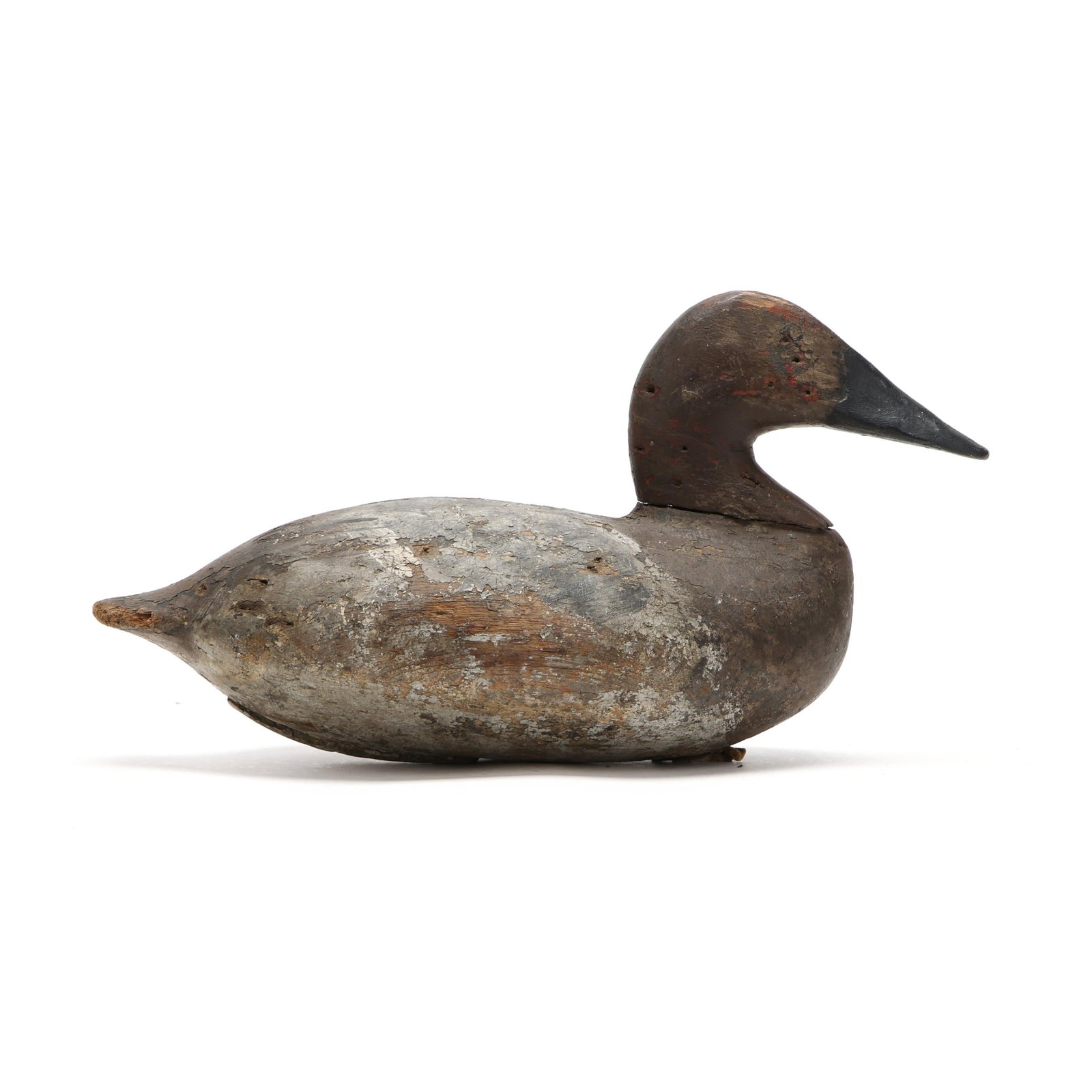 John Graham (MD, 1822-1912), Hen Canvasback: John Graham (MD, 1822-1912), Hen Canvasback Charlestown, Maryland, circa 1880s, carved and painted wood Length 13.5 in. x 7.5 x 6.5 From a Private Collection donated to benefit the conservation effort