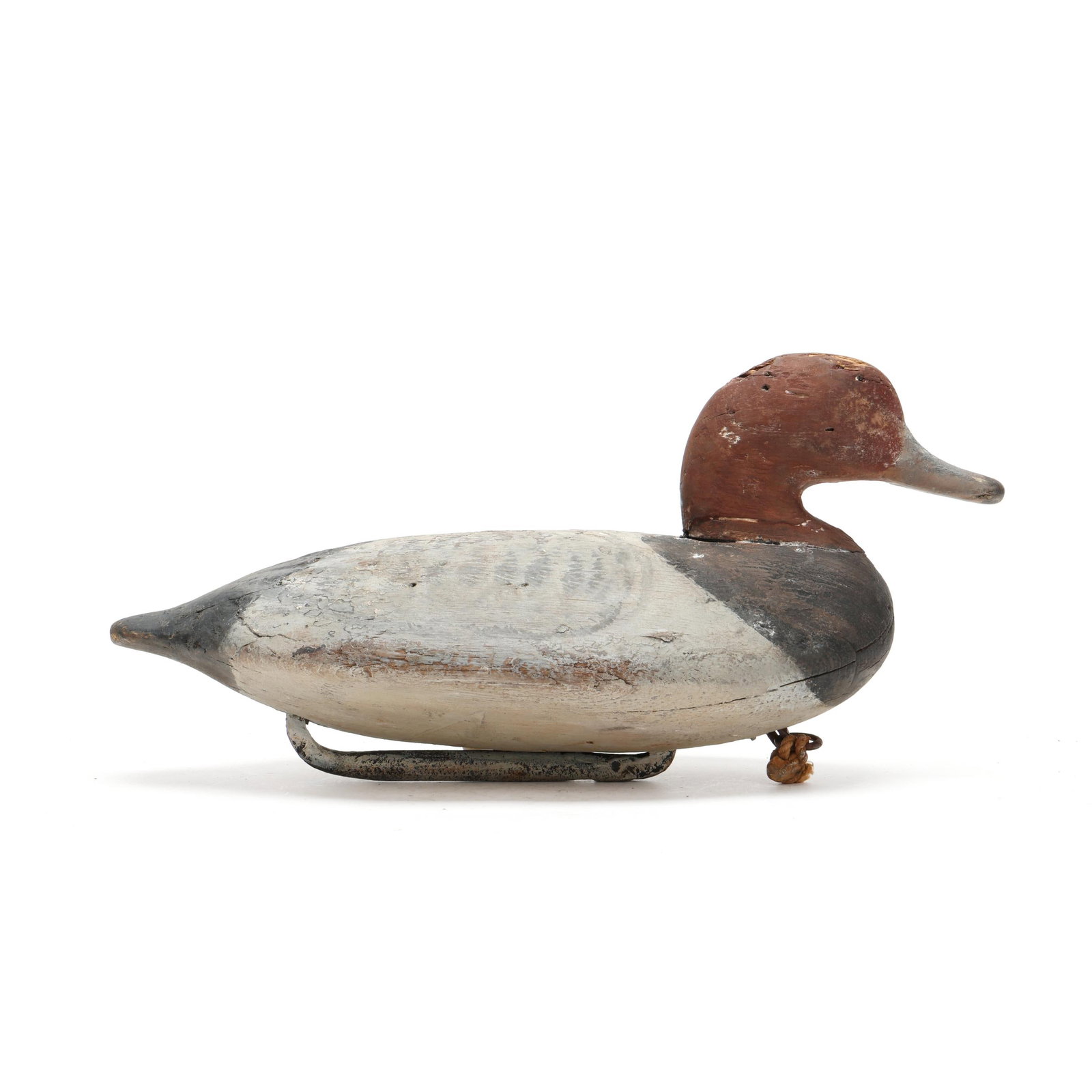 Ben Dye (MD, 1827-1896), Redhead: Ben Dye (MD, 1827-1896), Redhead Perryville, Maryland, circa 1870s, carved and painted wood. Length 14 in. x 6 x 6 From a Private Collection donated to benefit the conservation efforts of Ducks Unlimi