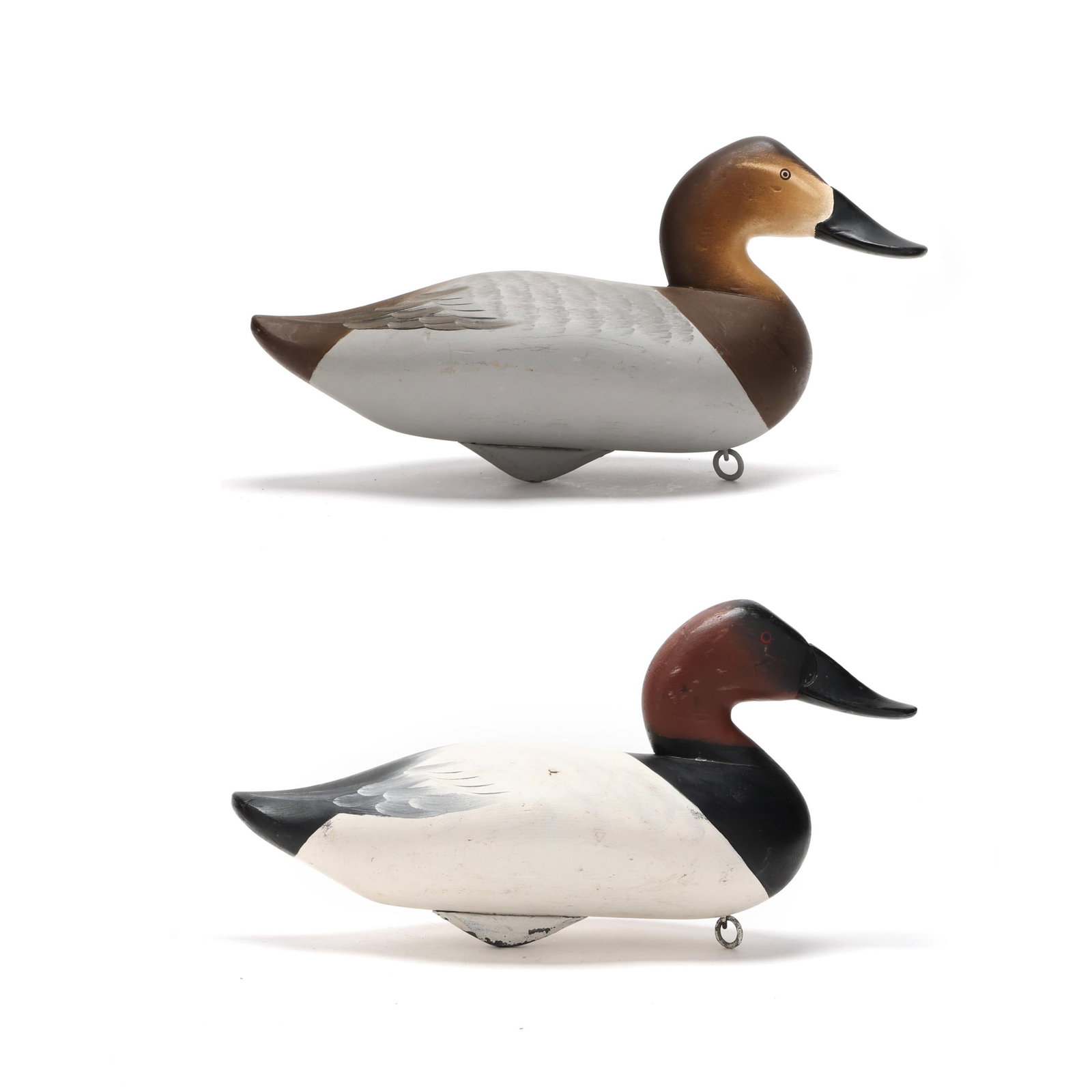 Charlie "Speed" Joiner (MD, 1921-2015), Pair of Canvasbacks: Charlie "Speed" Joiner (MD, 1921-2015), Pair of Canvasbacks Chestertown, Maryland circa 1965, carved and painted wood, signed and dated. Length 16 in. x 8.5 x 6.5 Extremely nice paint application. Fro