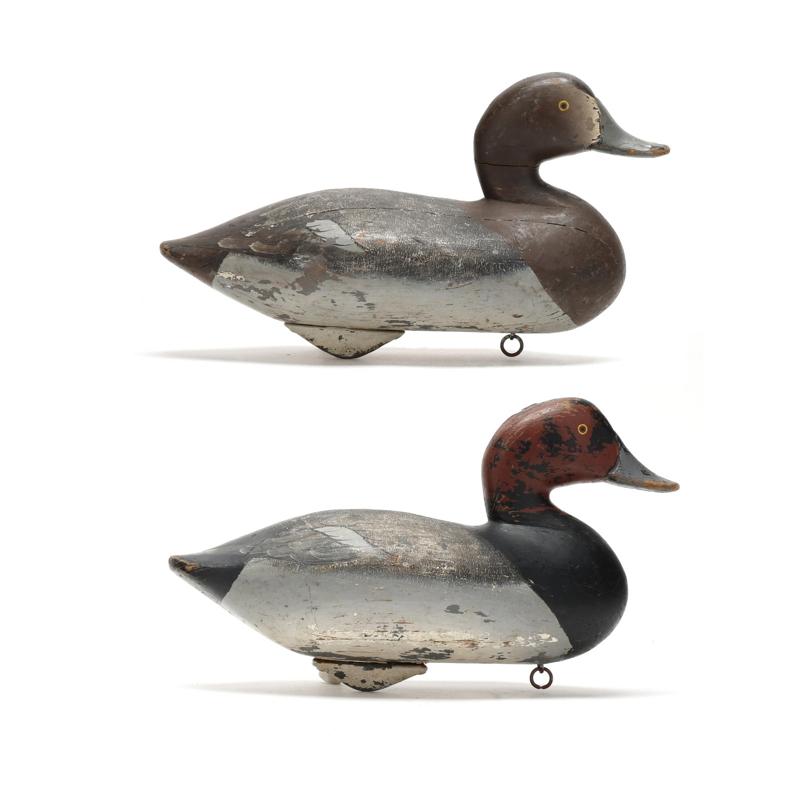 Charlie "Speed" Joiner (MD, 1921-2015), Pair of Redheads: Charlie "Speed" Joiner (MD, 1921-2015), Pair of Redheads Chestertown, Maryland, circa 1960, carved and painted wood, each branded HWJ. Length 13 in. x 8 x 6 From a Private Collection donated to benefi