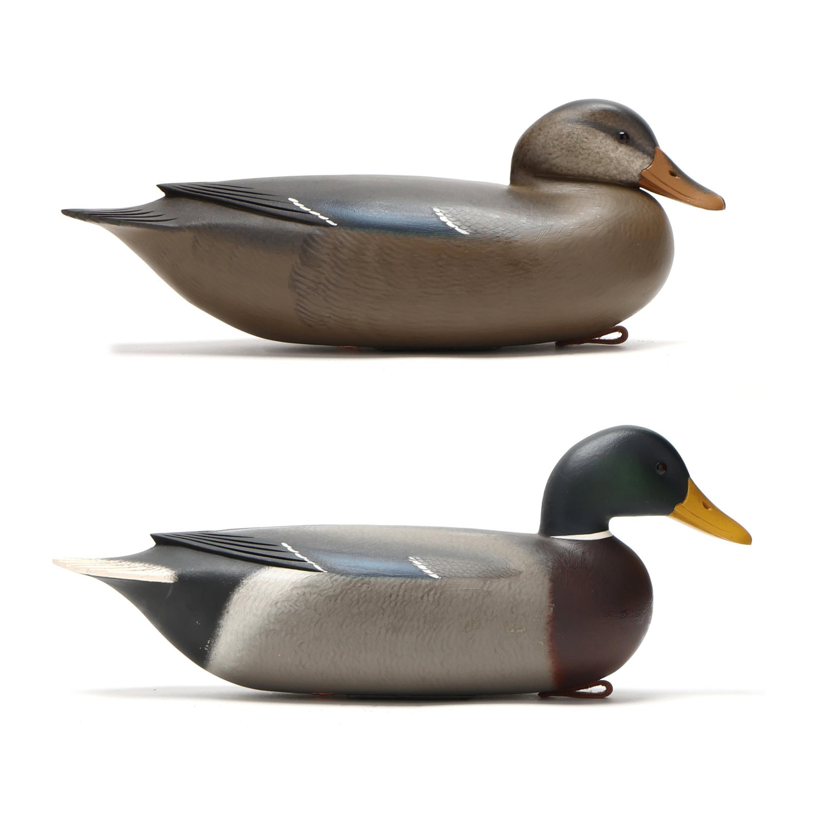 Frederick "Rick" Brown (NJ, b 1955), Pair of Mallards: Frederick "Rick" Brown (NJ, b 1955), Pair of Mallards Point Pleasant, New Jersey, circa 2007, carved and painted wood glass eyes, makers copper tag on each, signed and dated. Length 16 in. x 6 x 6 A w