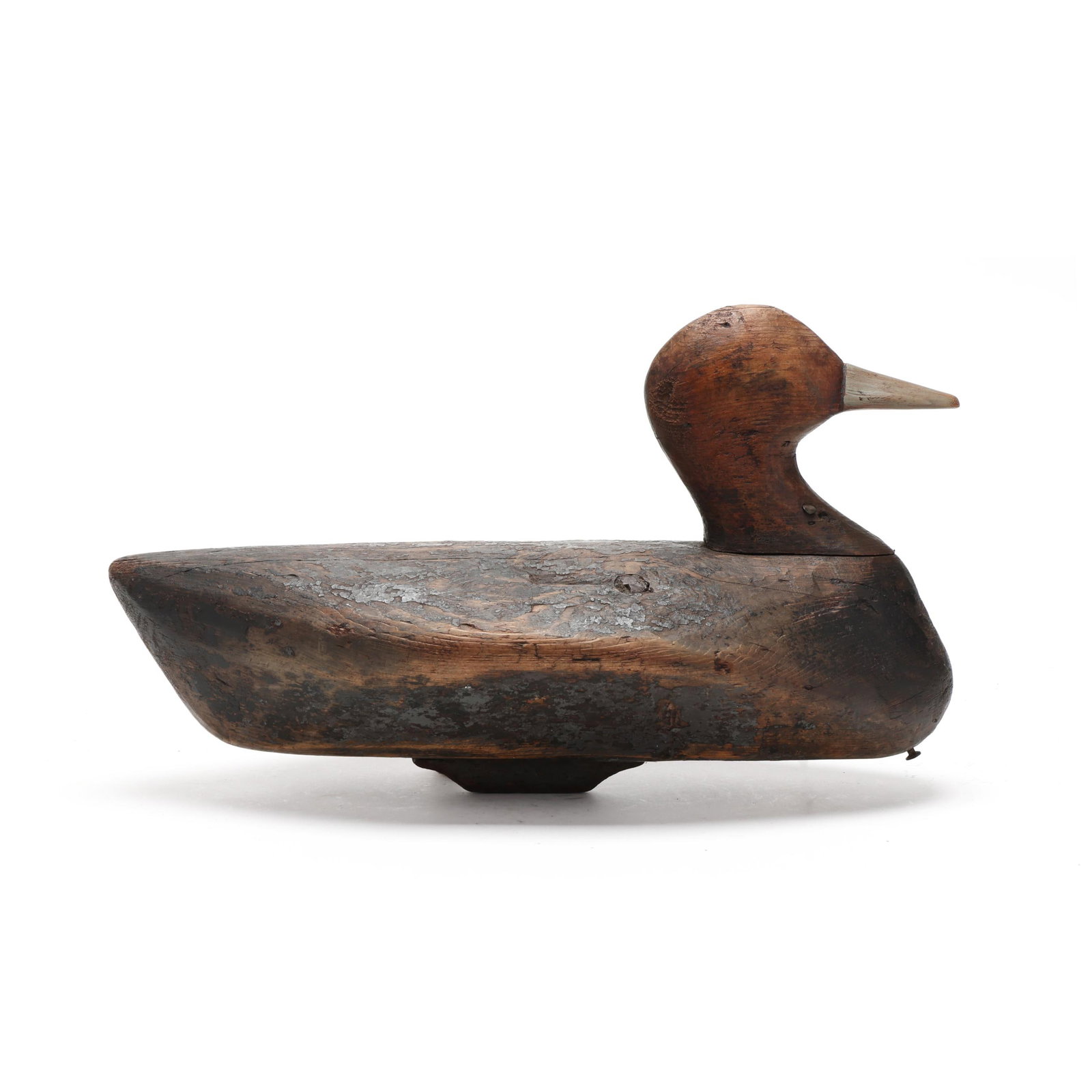 Charlie Snowden (NC, 1909-1979), Redhead: Charlie Snowden (NC, 1909-1979), Redhead Maple, North Carolina, circa 1930s, carved and painted wood. Length 16 in. x 9 x 7.5 From a Private Collection donated to benefit the conservation efforts of D