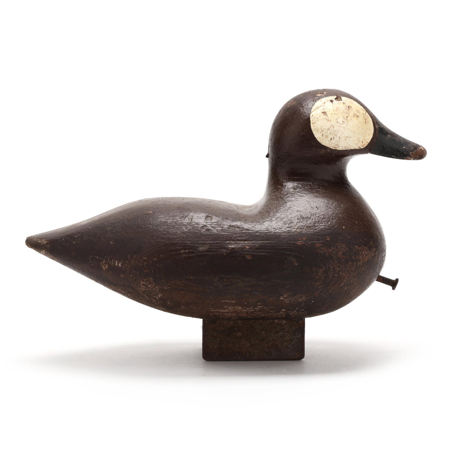 Fat Ruddy Duck: Fat Ruddy Duck Probably Knotts Island, North Carolina, circa 1980s, carved and painted wood, a unique iron ballast. Length 12 in. x 8.5 x 5.75 Inspired by those found in the John Williams hunting rig.